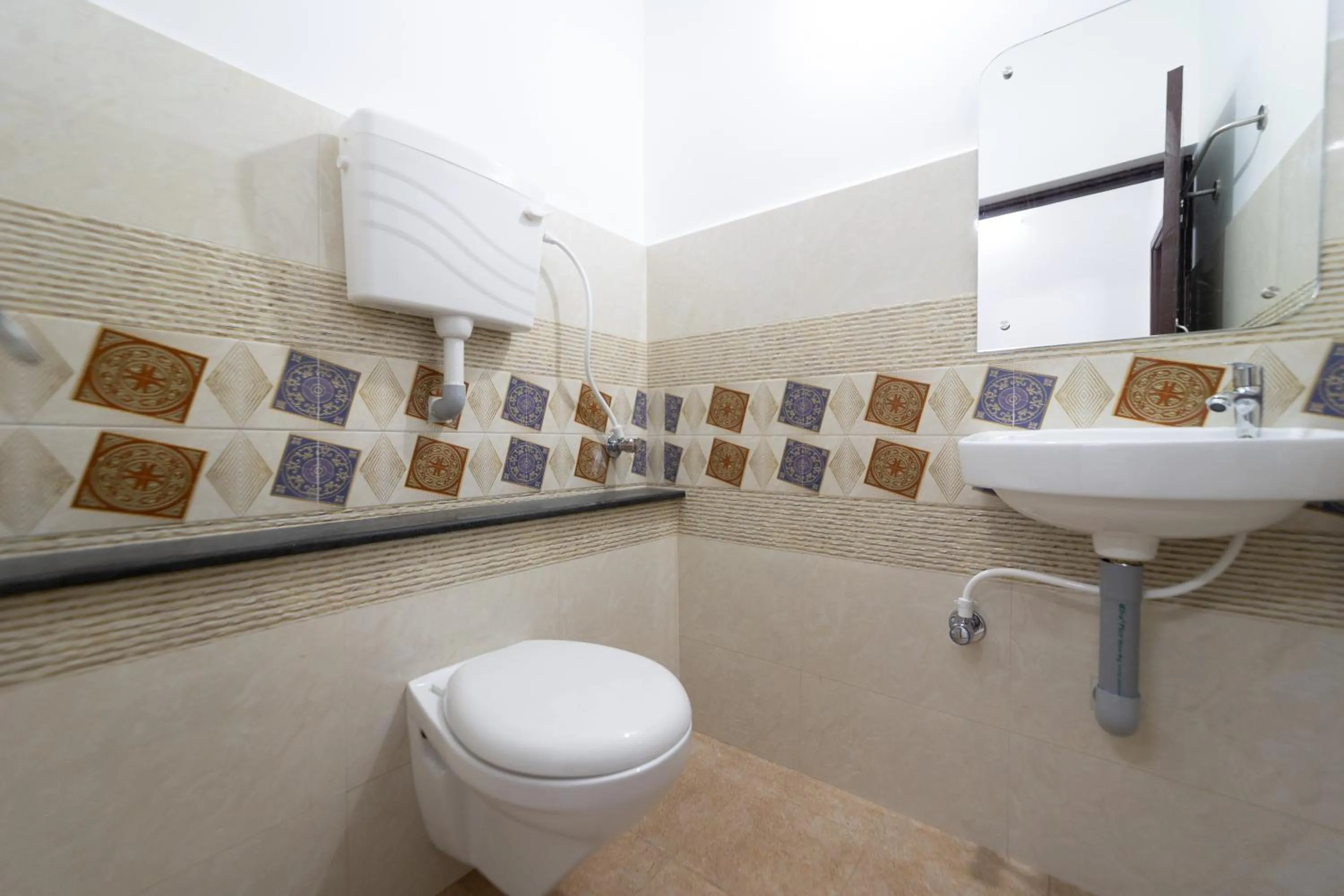 Toilet in Bonne Chance Heritage Residence