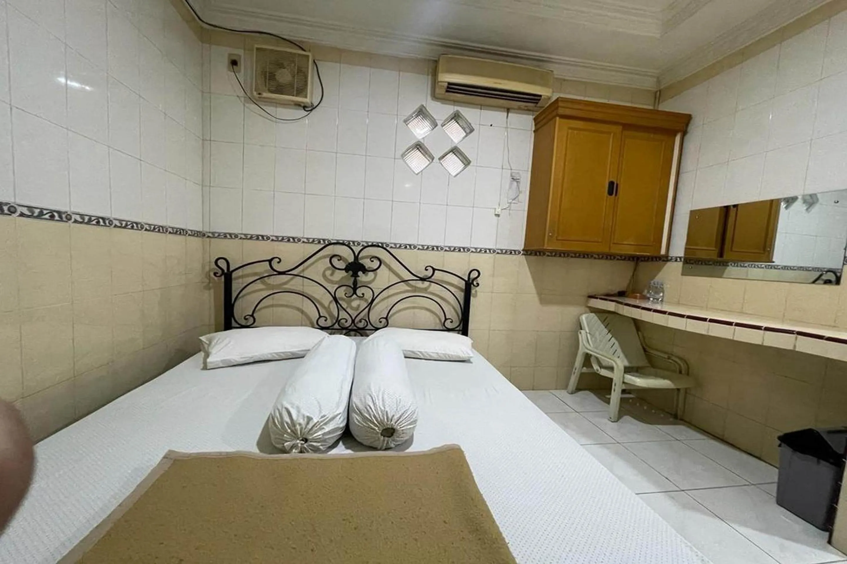 Bedroom, Bed in Hotel O Homestay Pakmuklis Syariah 2 Near Taman Mini Lhokseumawe