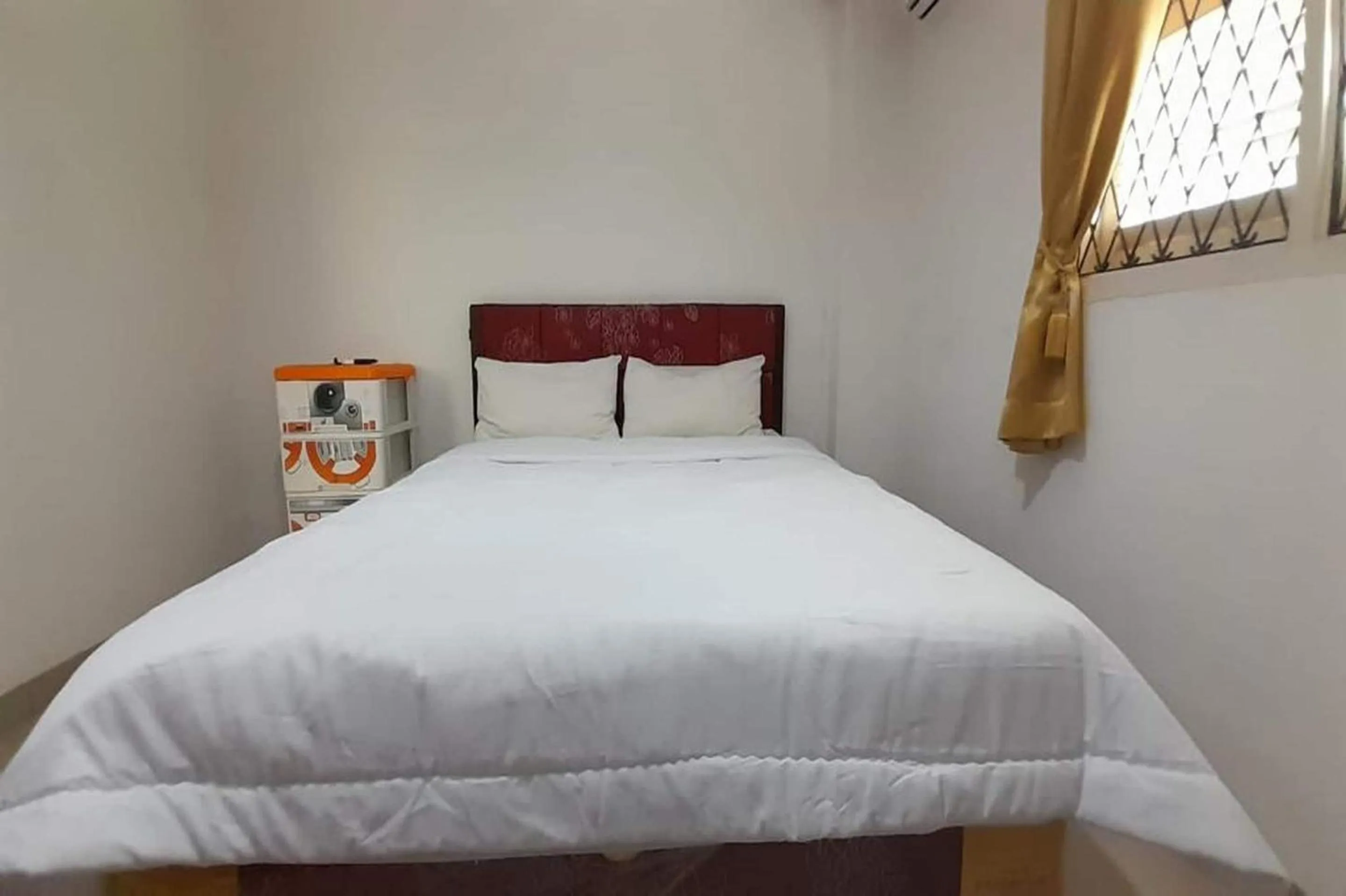 Bedroom, Bed in Hotel O Homestay Pakmuklis Syariah 2 Near Taman Mini Lhokseumawe