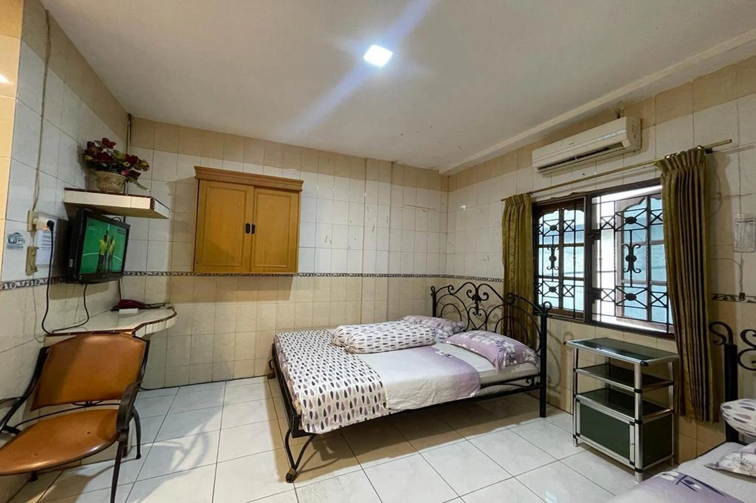 Bedroom, Bed in Hotel O Homestay Pakmuklis Syariah 2 Near Taman Mini Lhokseumawe