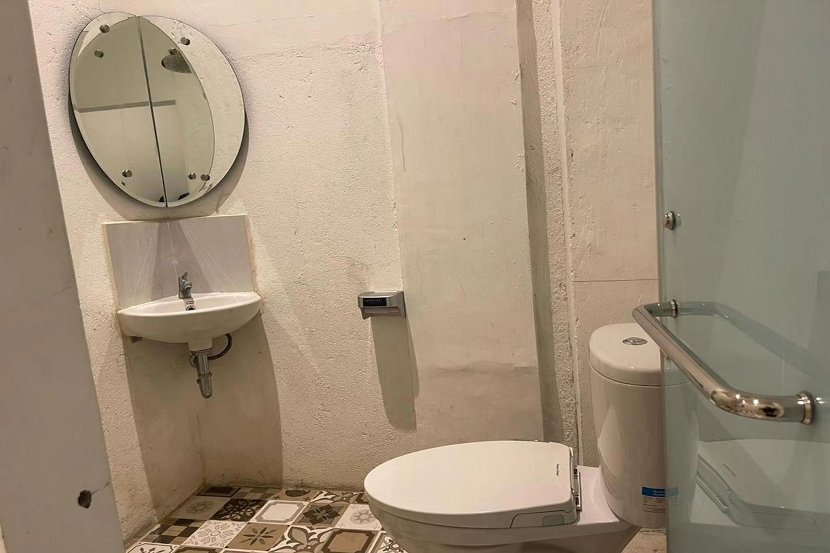 Bathroom in Hotel O Saril Riverside HomestayNearLapangan Musara Alun