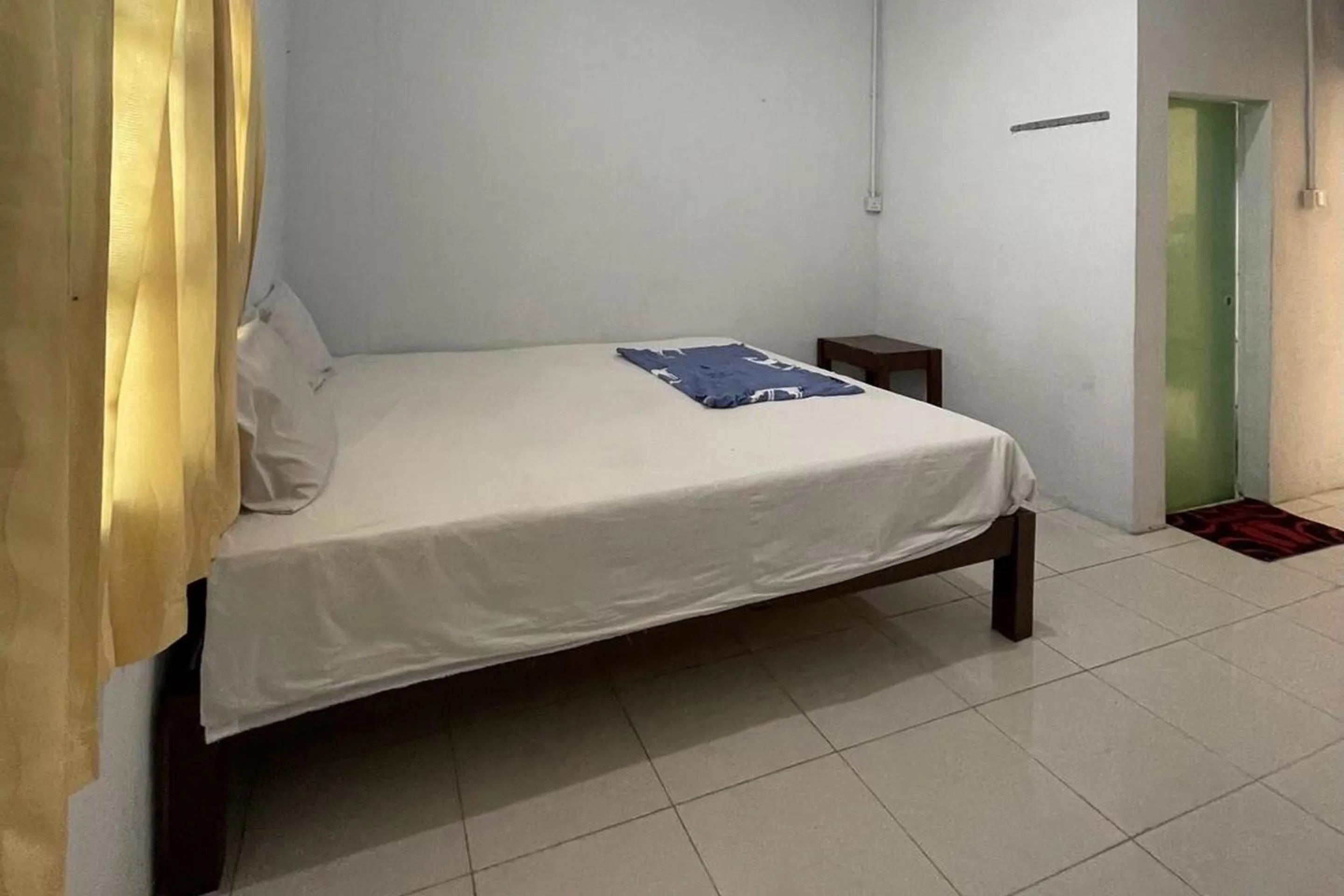 Bedroom in Hotel O Saril Riverside HomestayNearLapangan Musara Alun