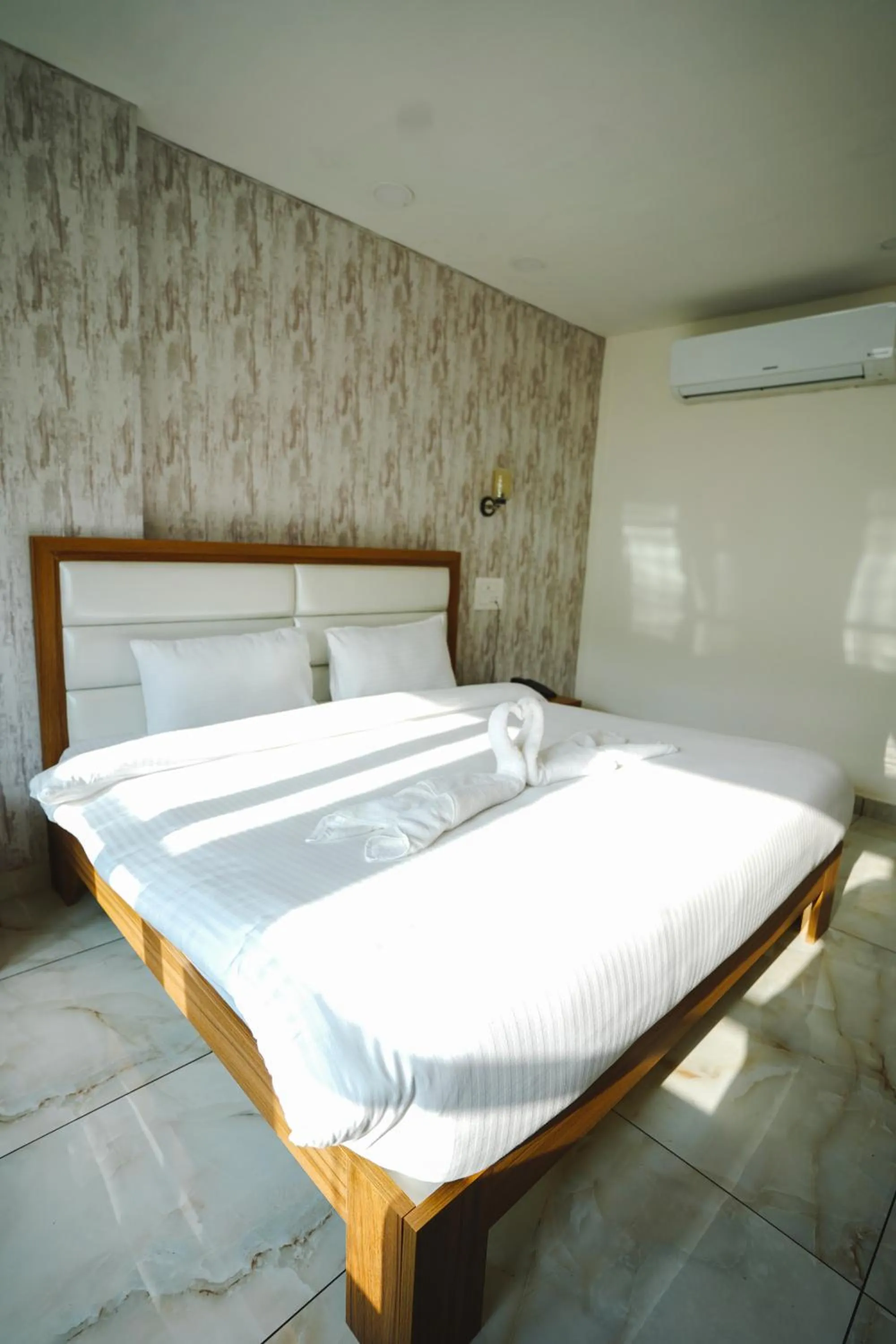 Bed in Hotel Northwind Mohali