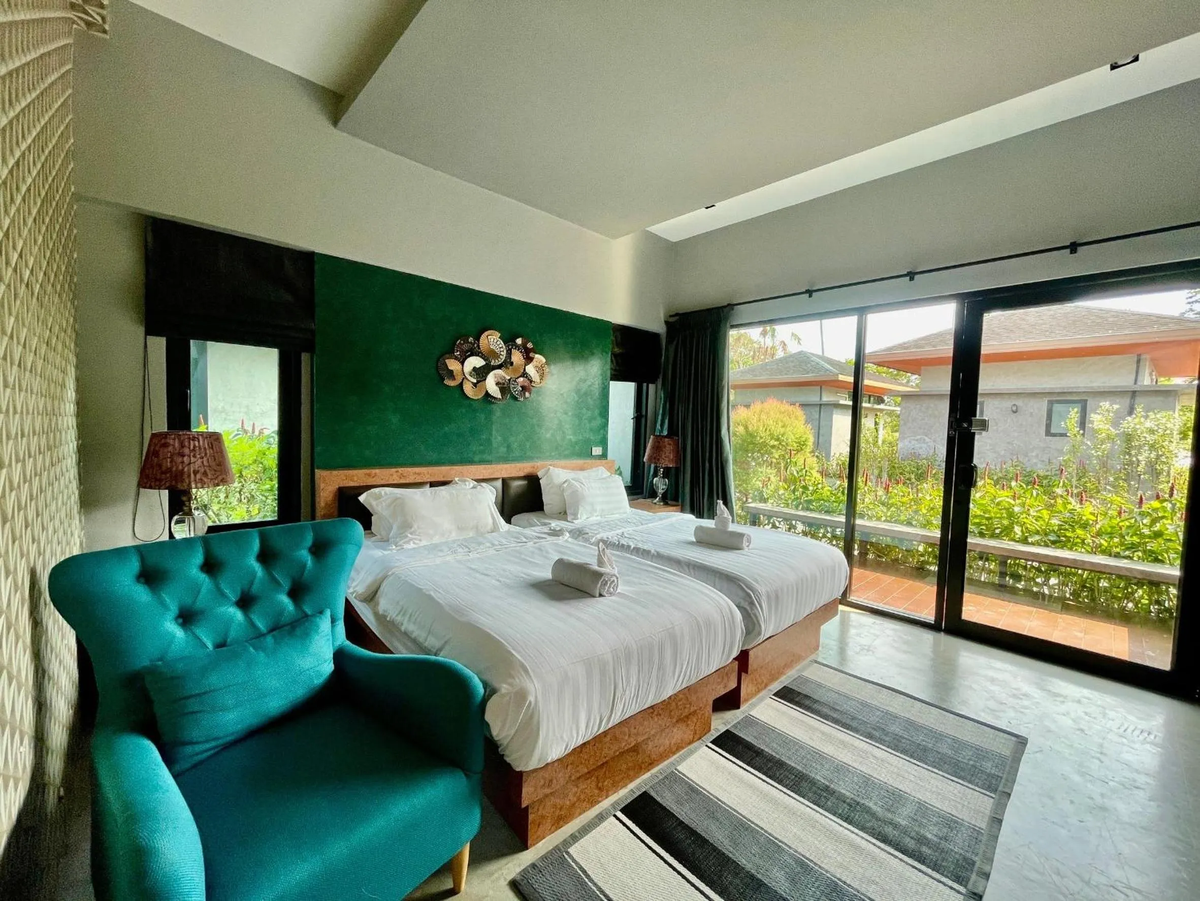 Bed in ProudChan Boutique Resort