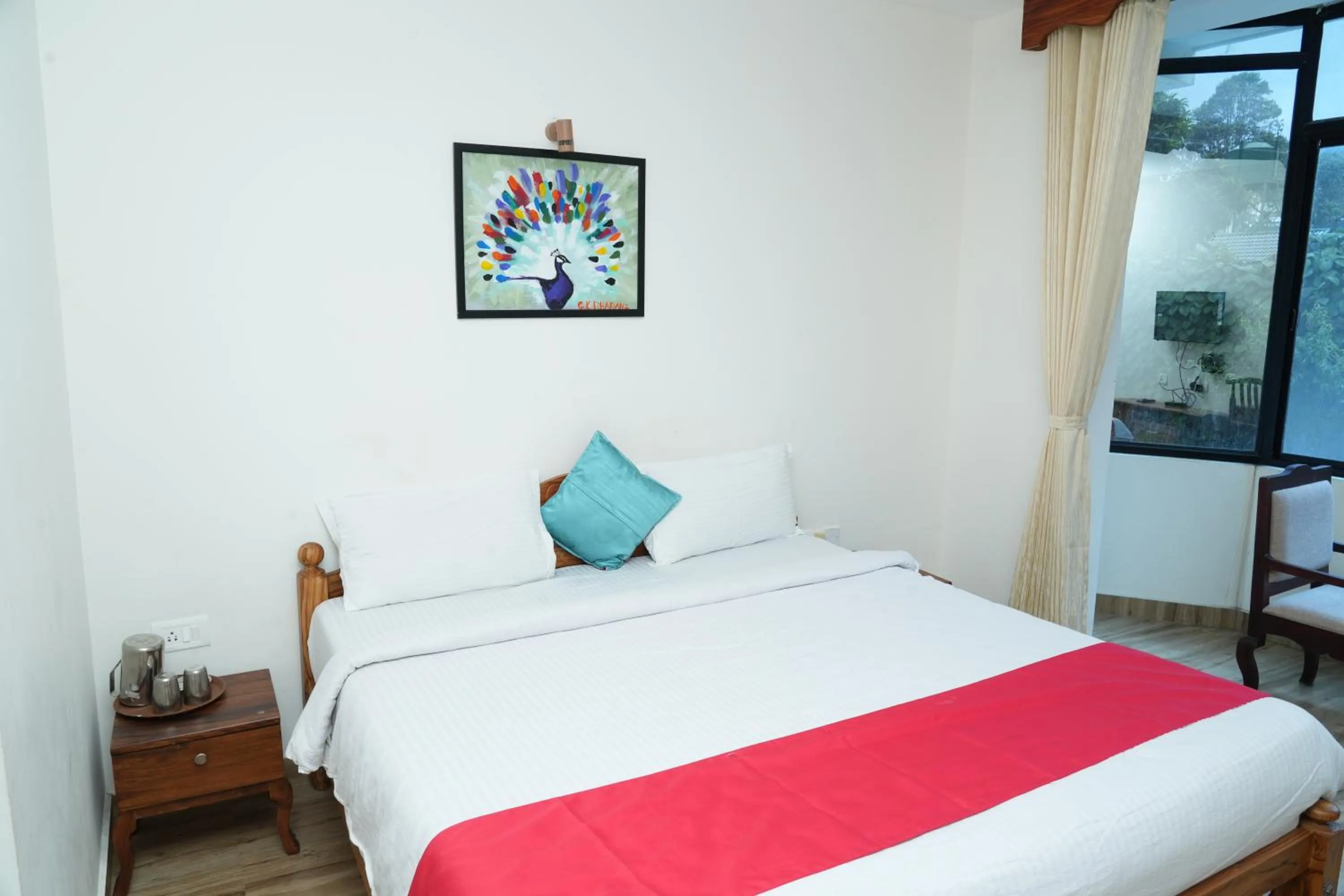 Bed in Vetrivel International by Brown Tree Resorts