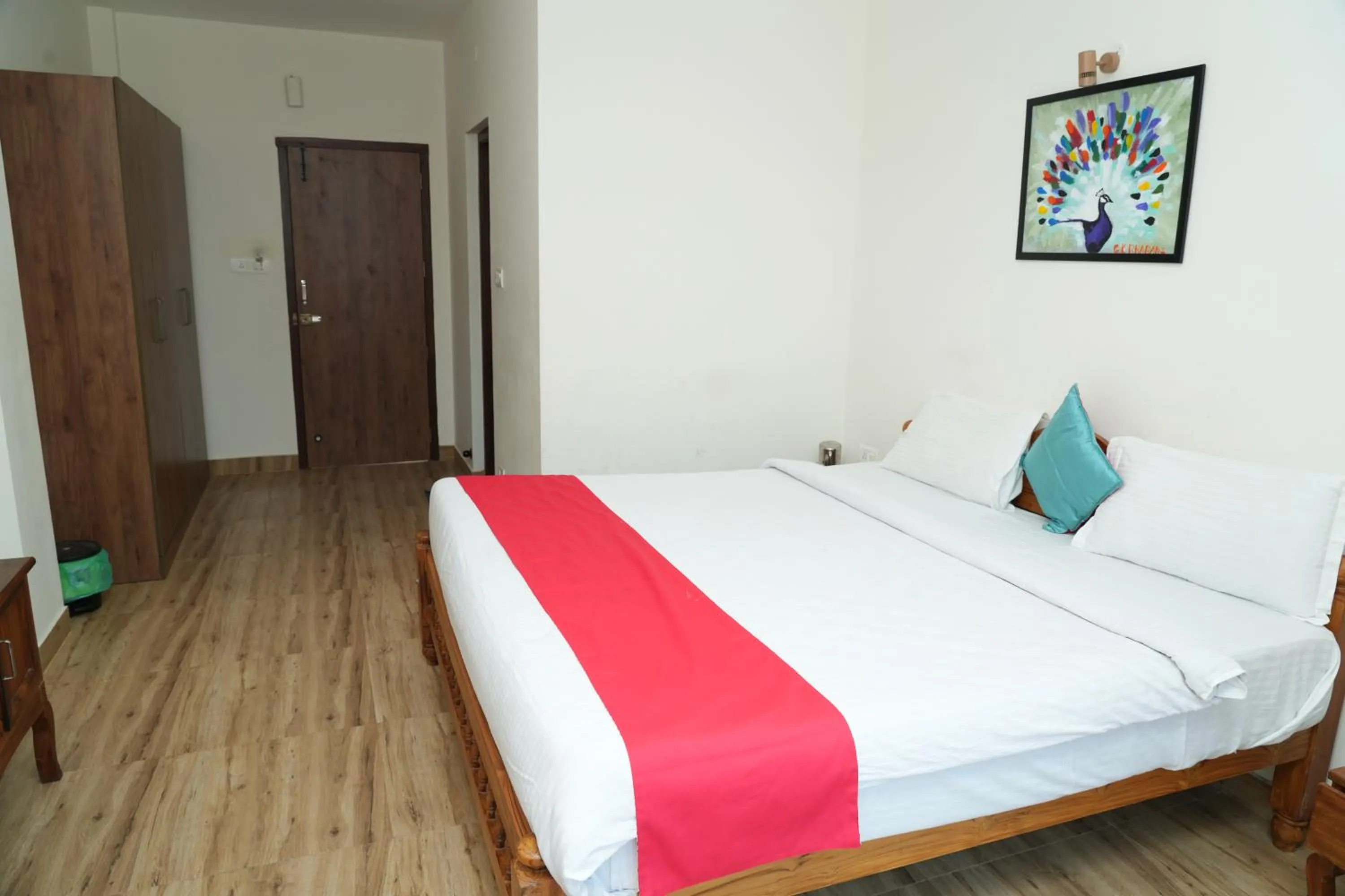 Bed in Vetrivel International by Brown Tree Resorts