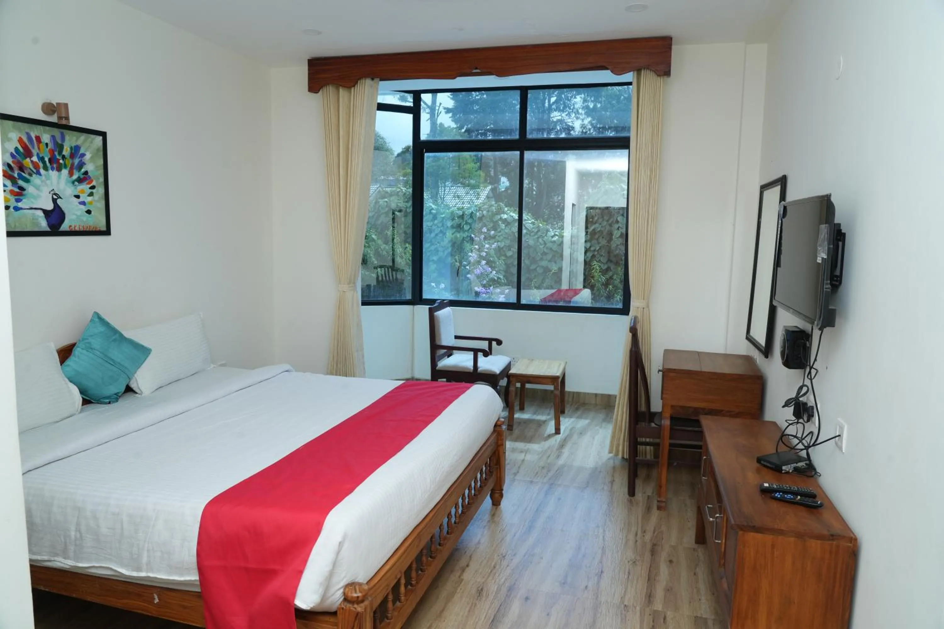 Bed in Vetrivel International by Brown Tree Resorts