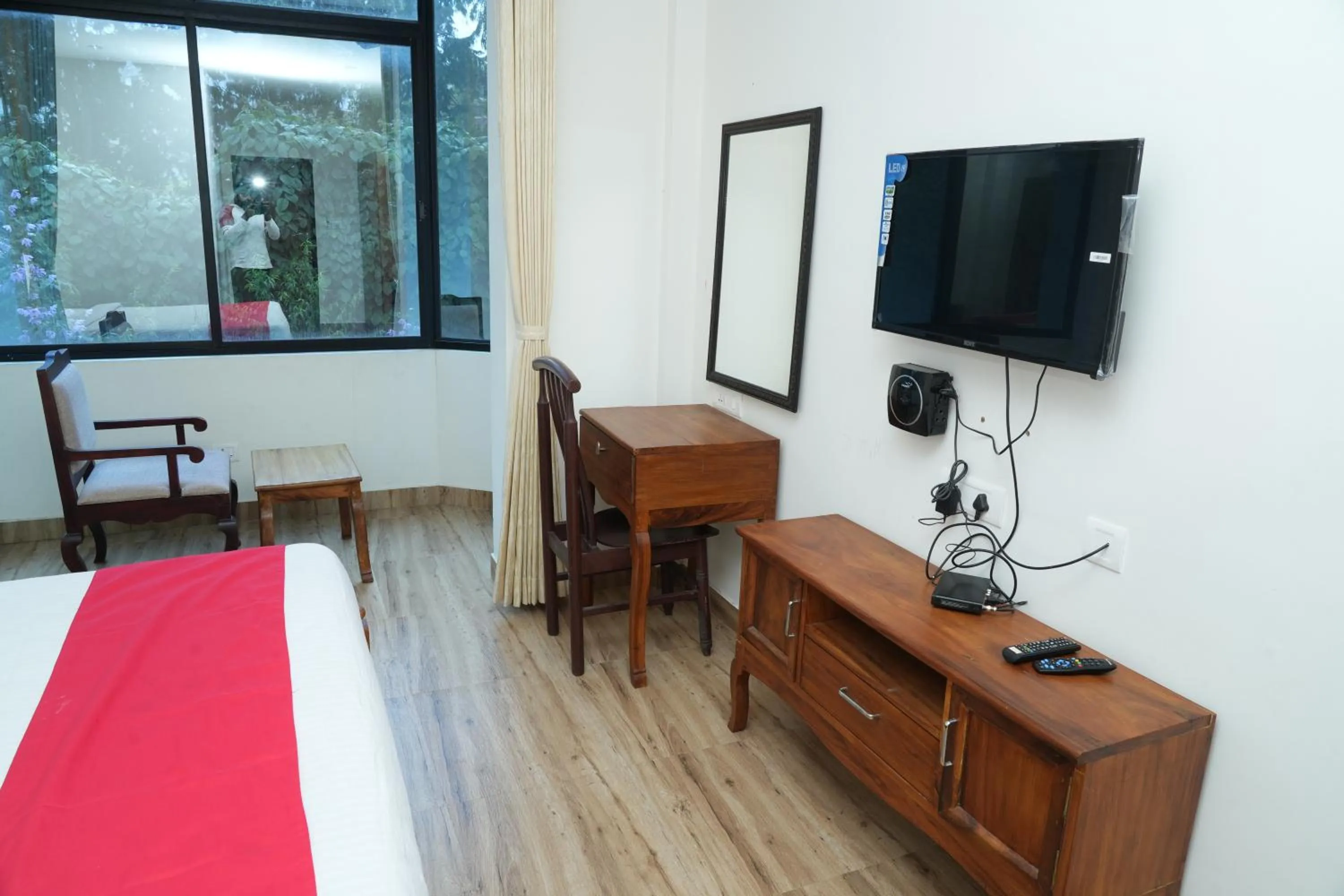 Bed in Vetrivel International by Brown Tree Resorts