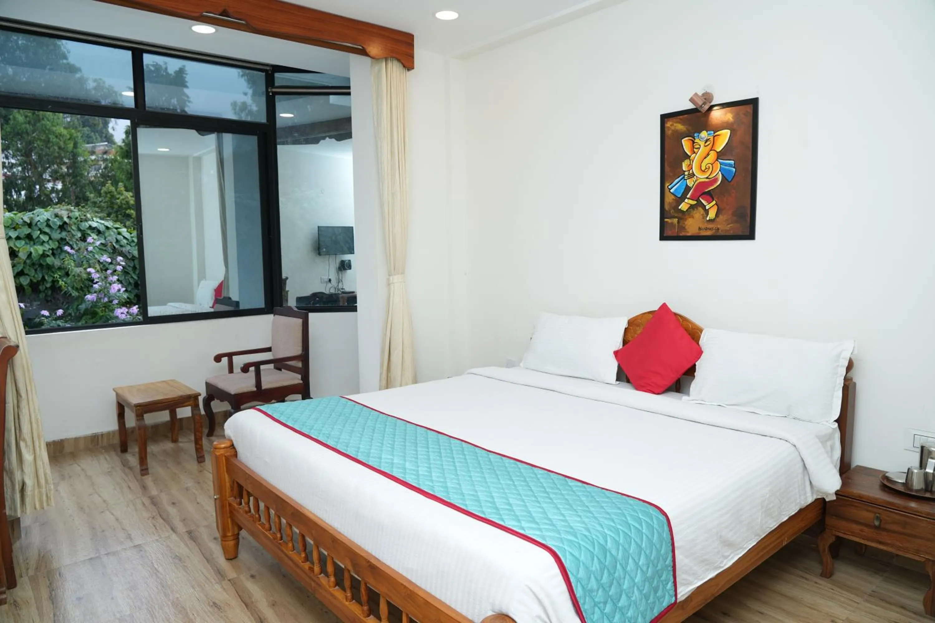 Bed in Vetrivel International by Brown Tree Resorts