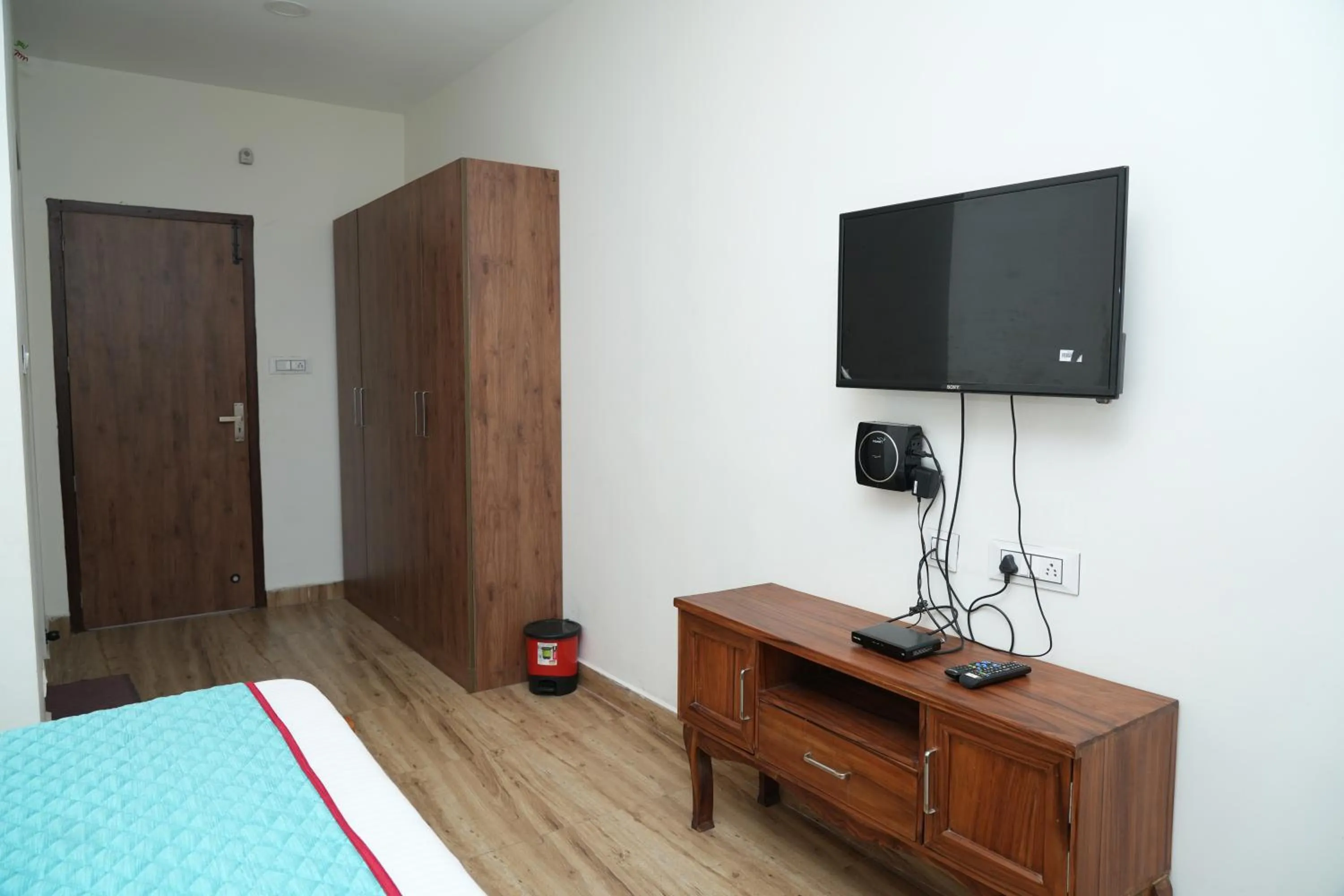 Bed in Vetrivel International by Brown Tree Resorts