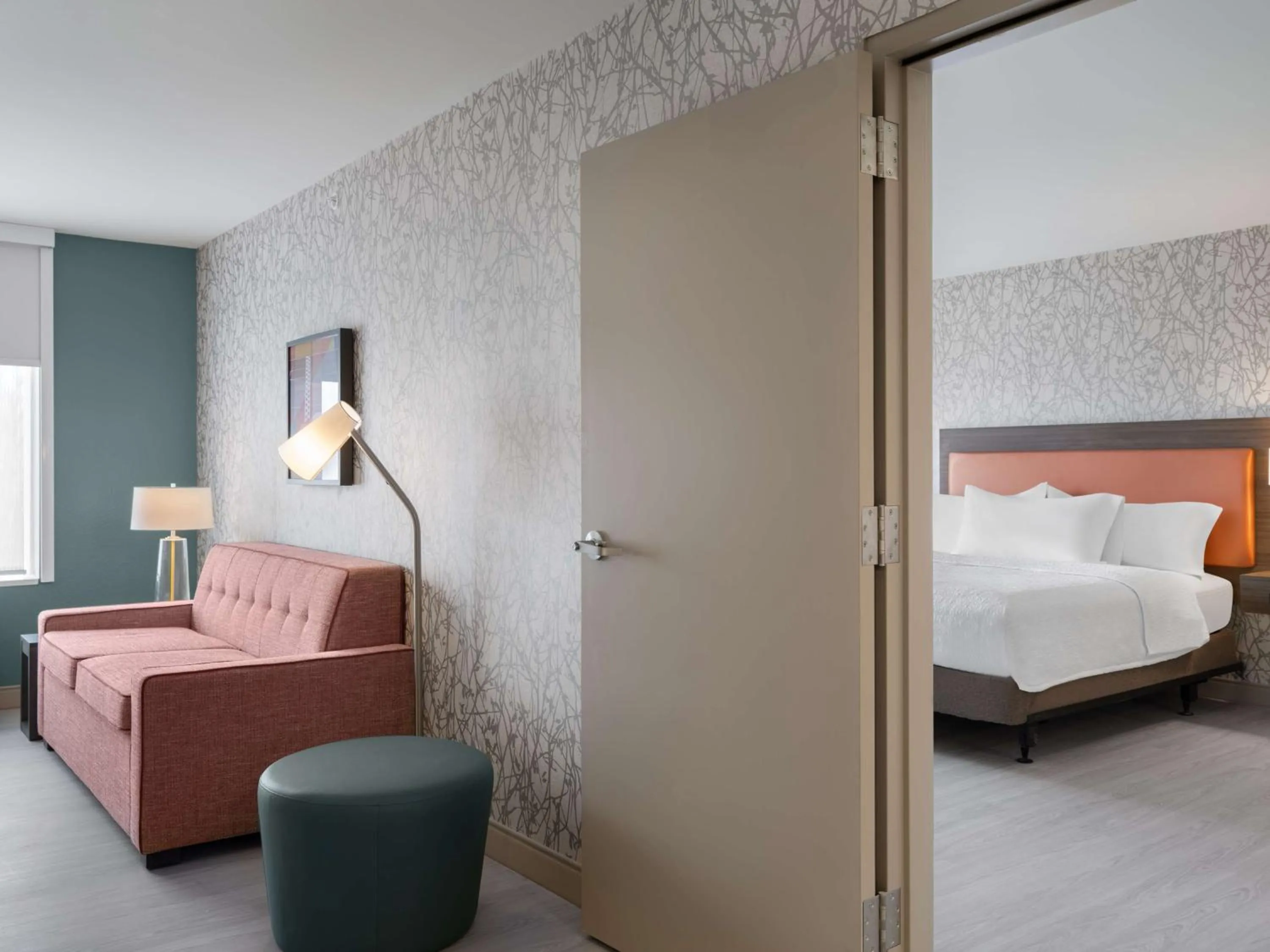 Living room, Bed in Home2 Suites By Hilton Brownsburg