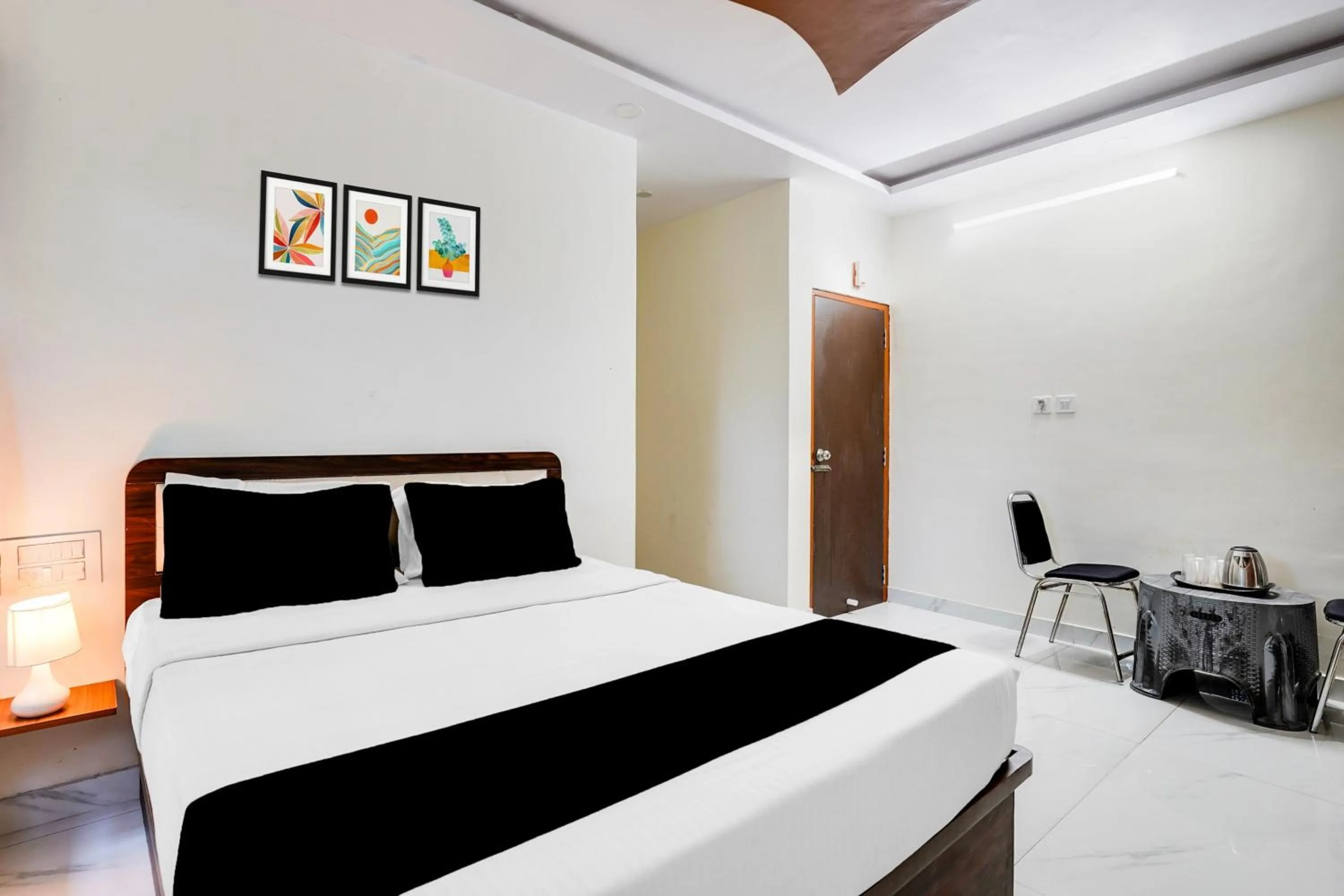 Bedroom in Super Townhouse Bidadi Formerly Royal Garuda