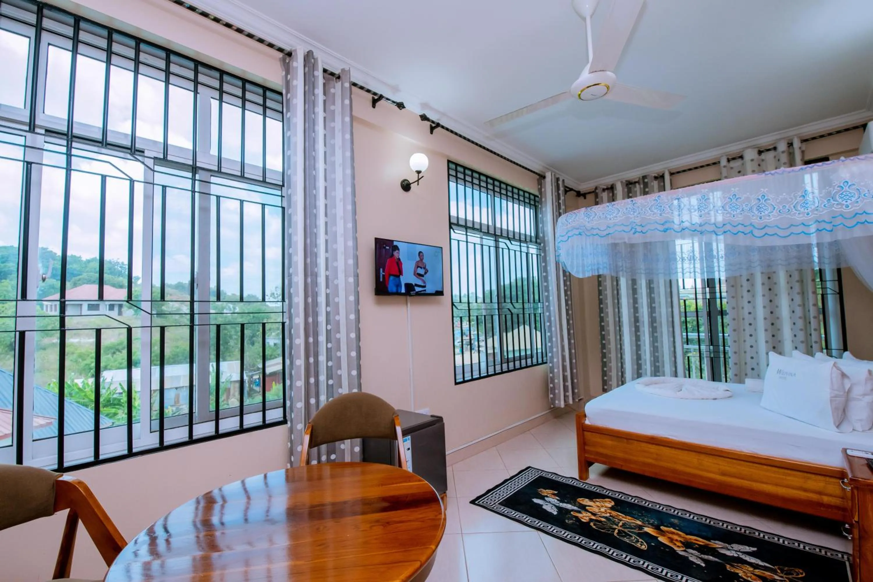 Bed in WILIVINA HOTEL