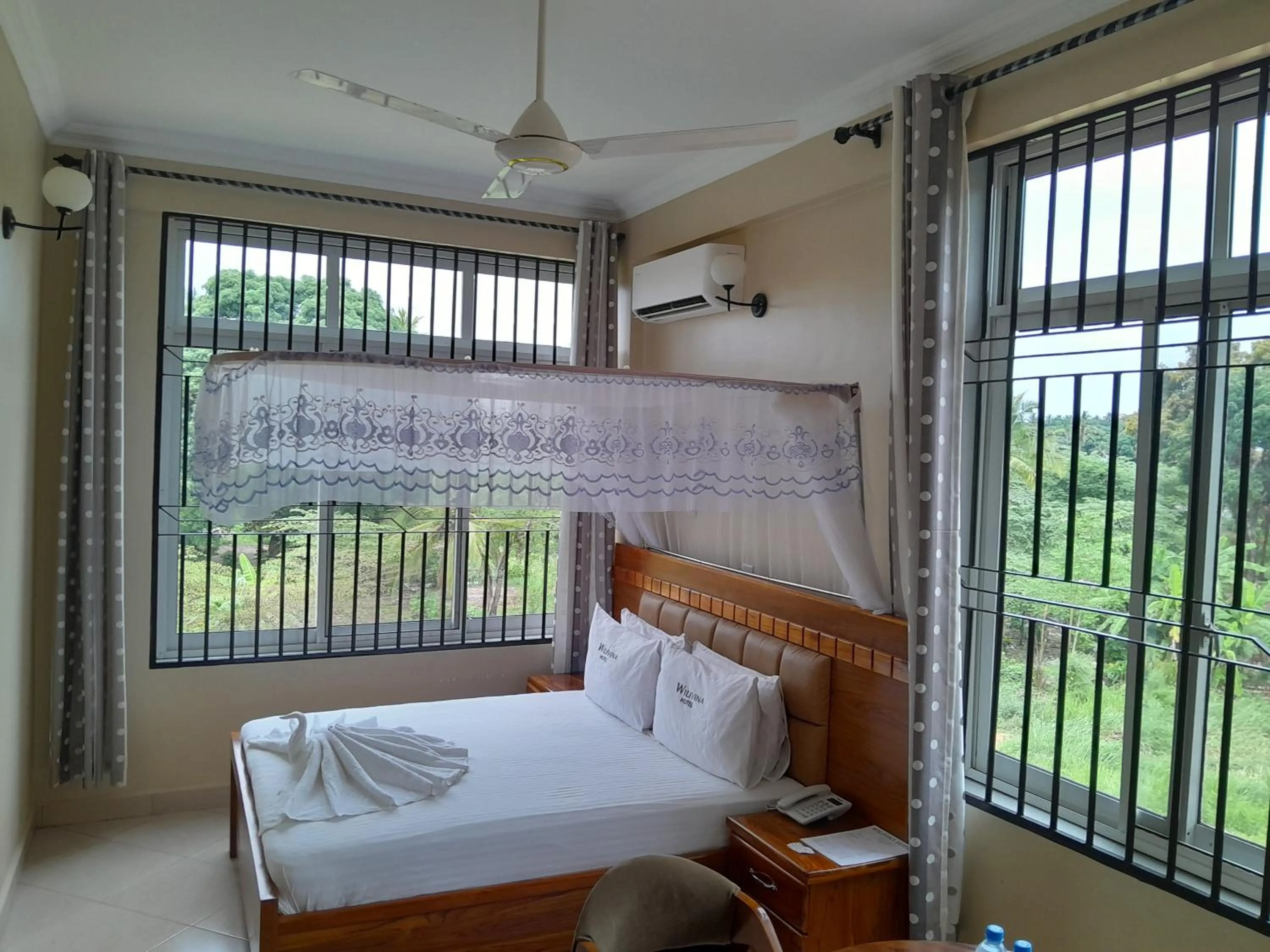 Bed in WILIVINA HOTEL