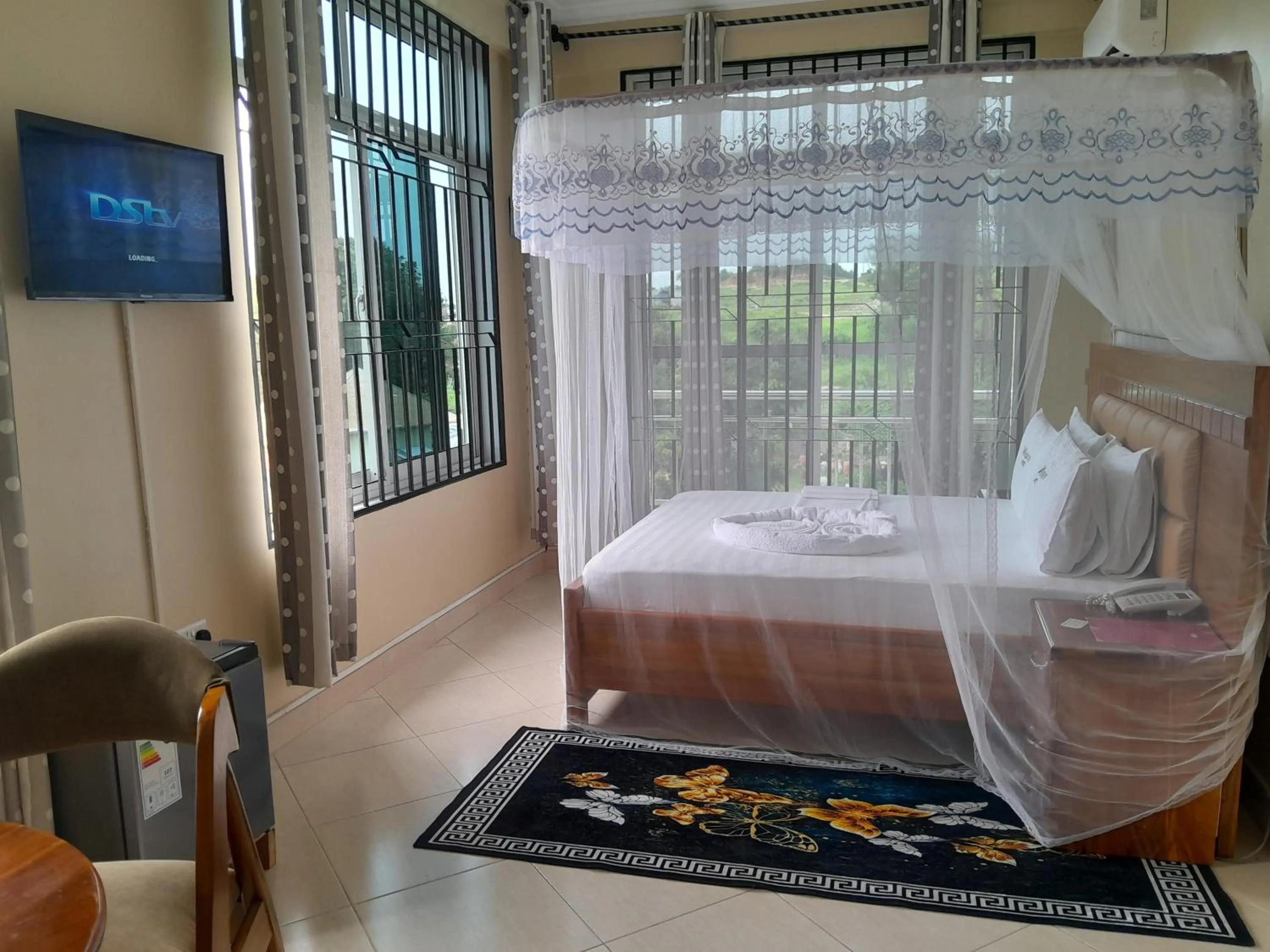 Bed in WILIVINA HOTEL