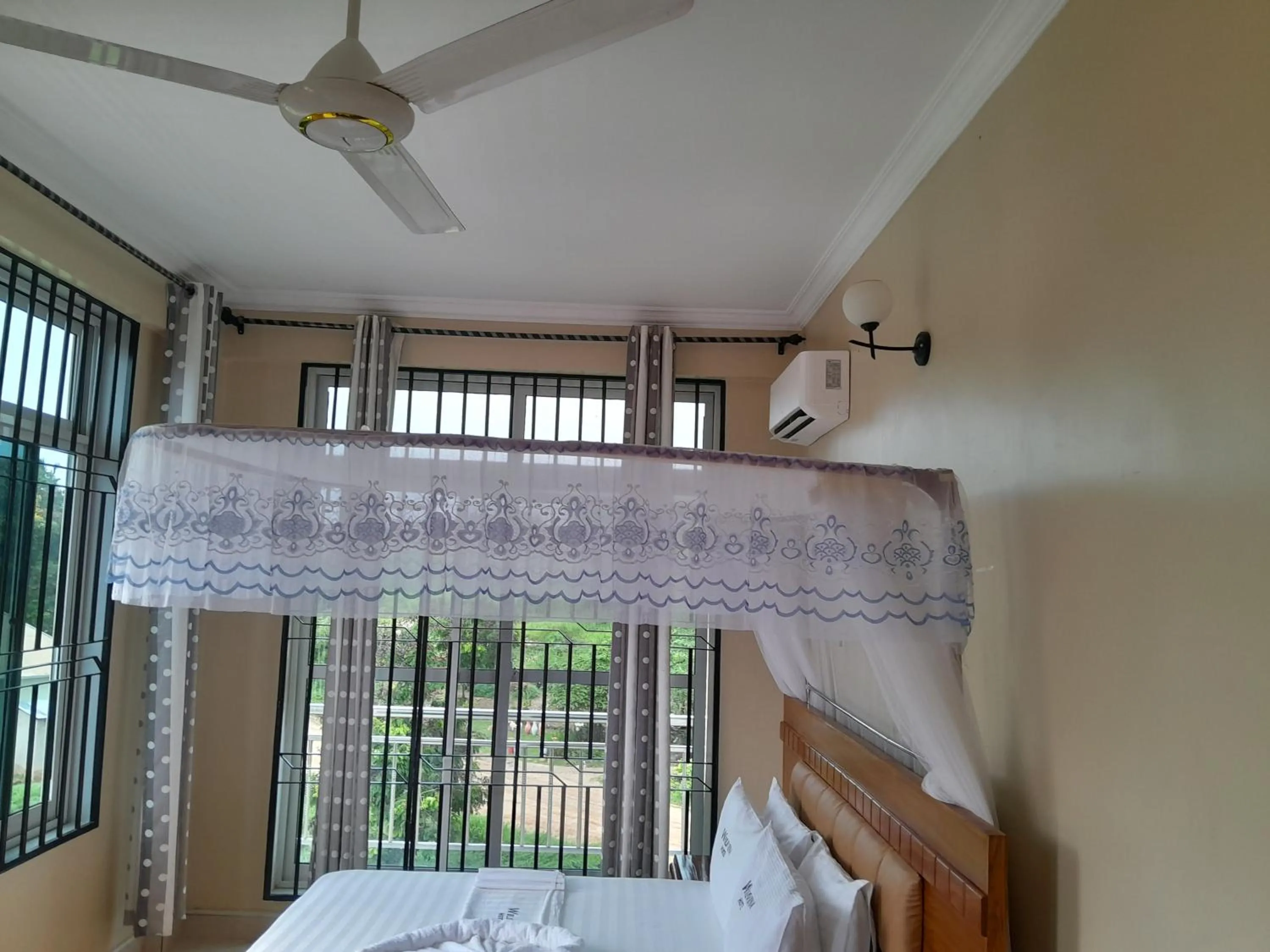 fireplace, Bed in WILIVINA HOTEL