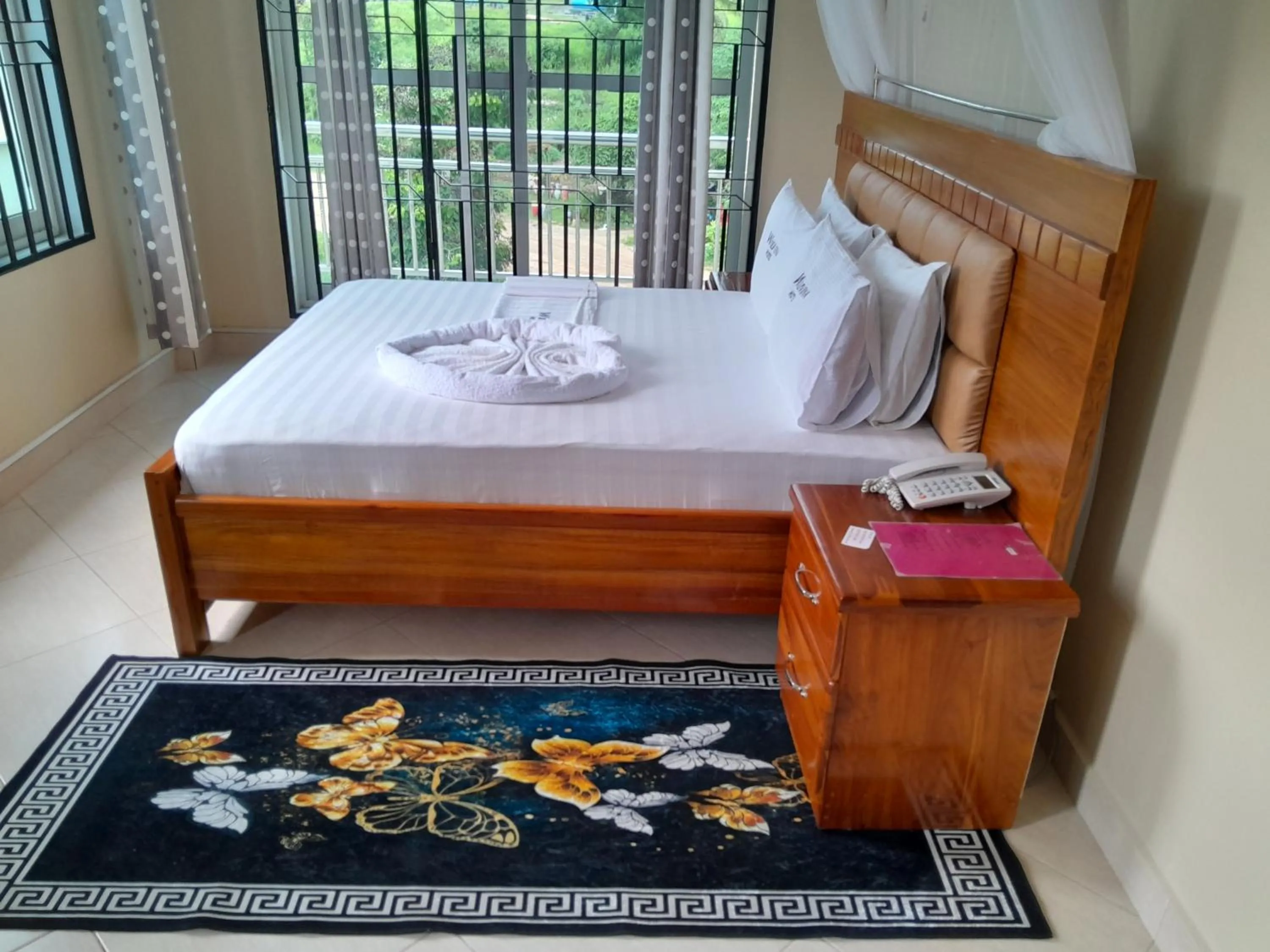 Bed in WILIVINA HOTEL