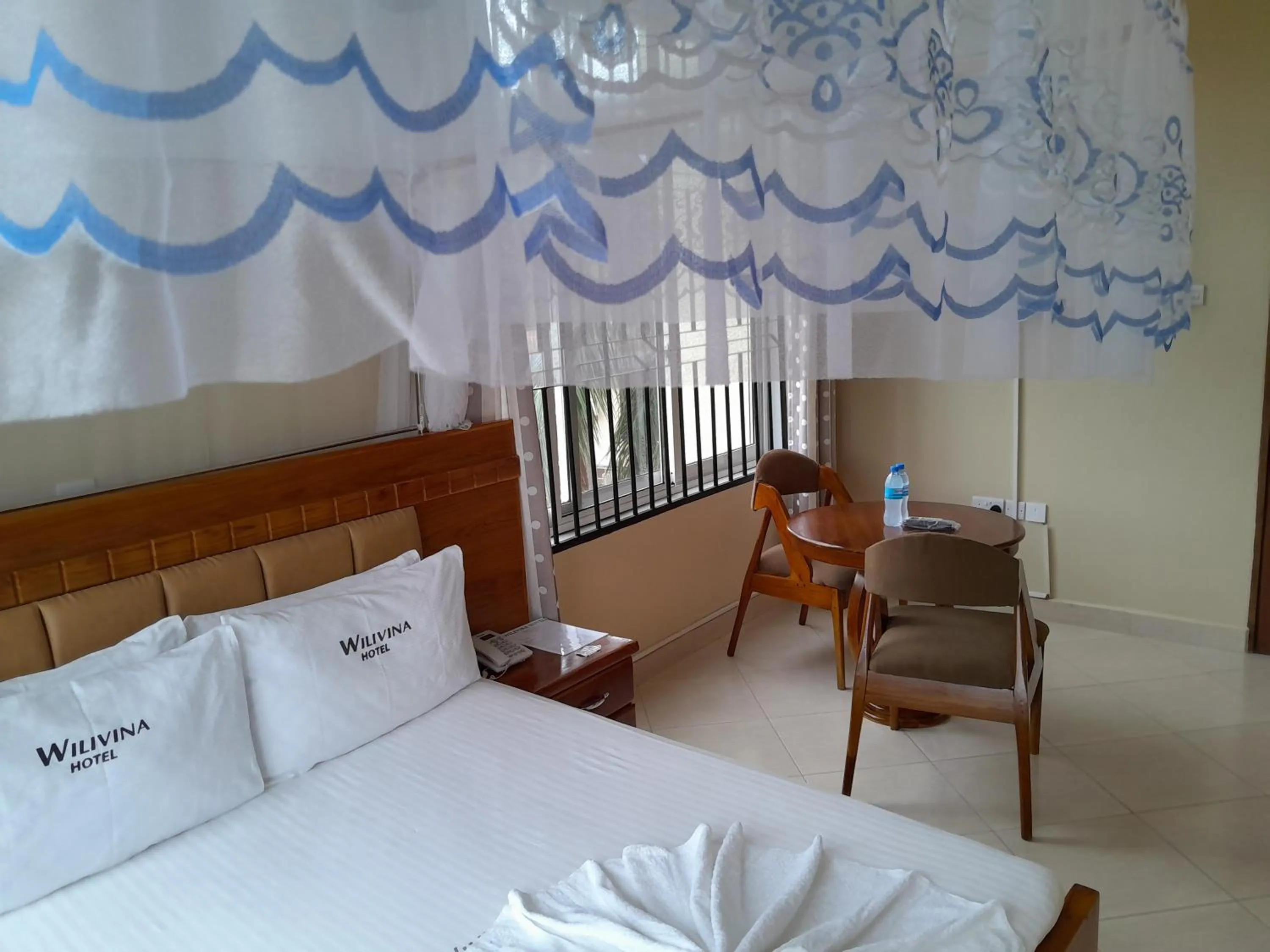 Bed in WILIVINA HOTEL