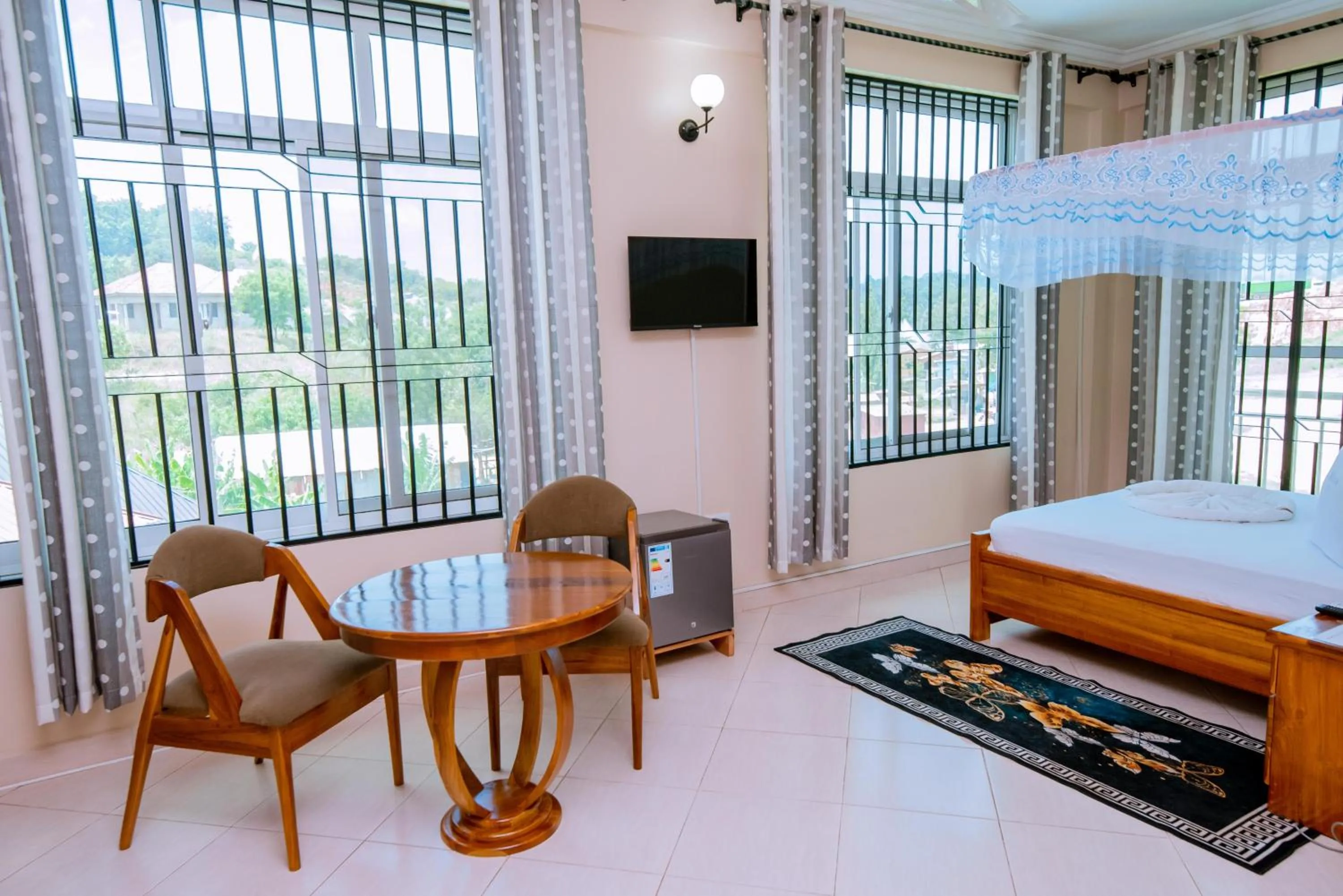 Bed in WILIVINA HOTEL