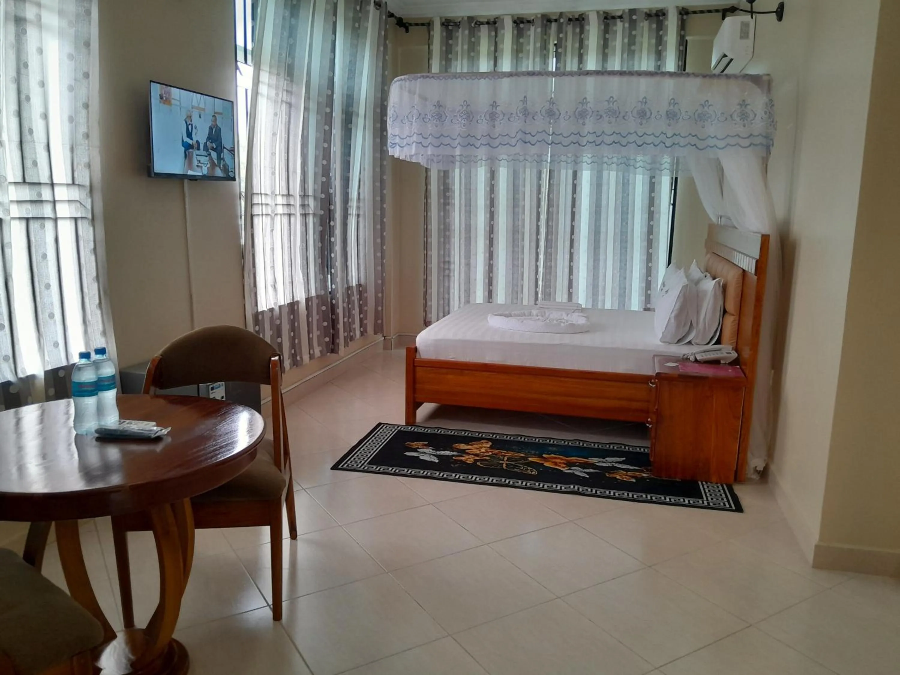 Living room, Bed in WILIVINA HOTEL