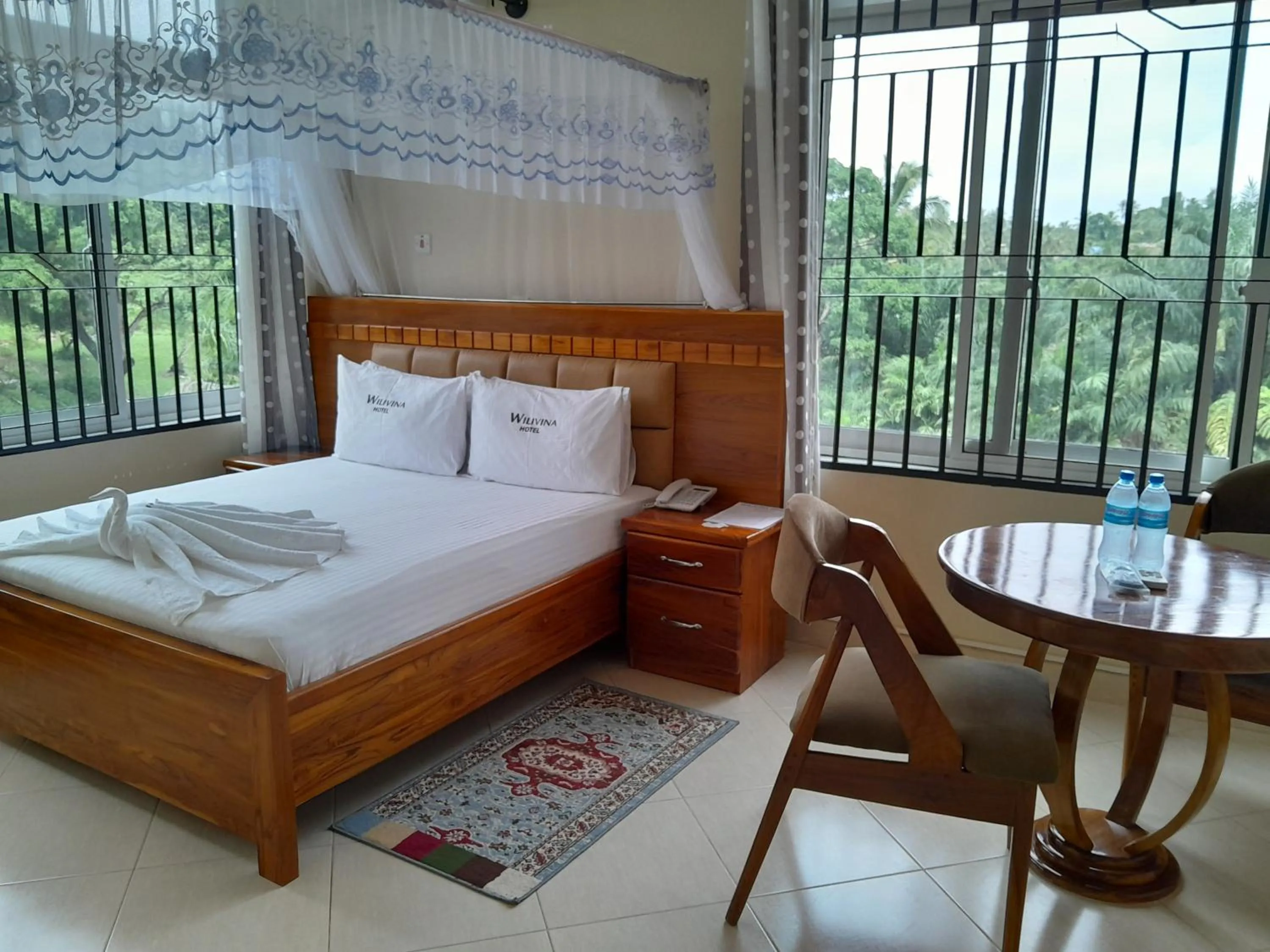 View (from property/room), Bed in WILIVINA HOTEL