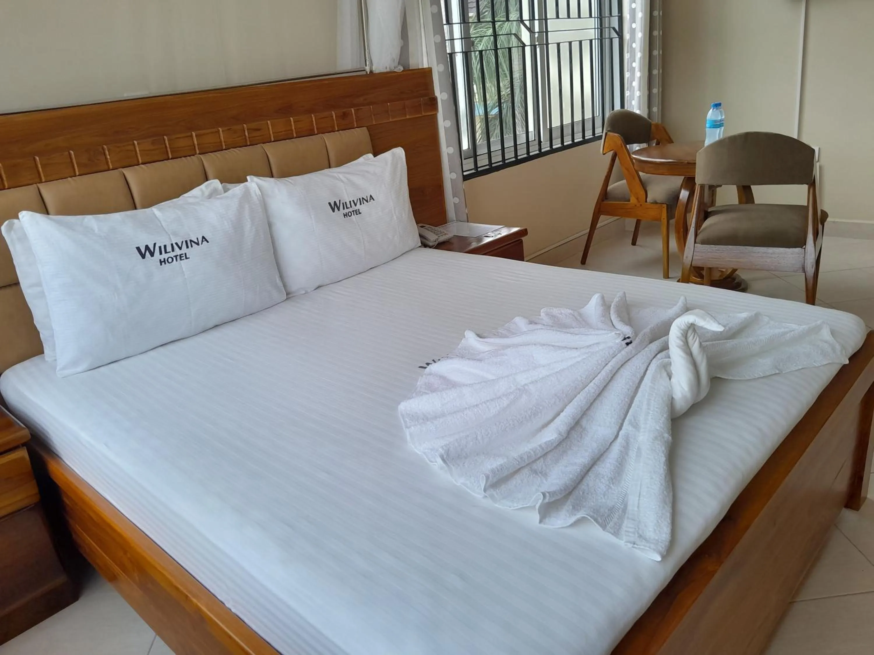 Bed in WILIVINA HOTEL