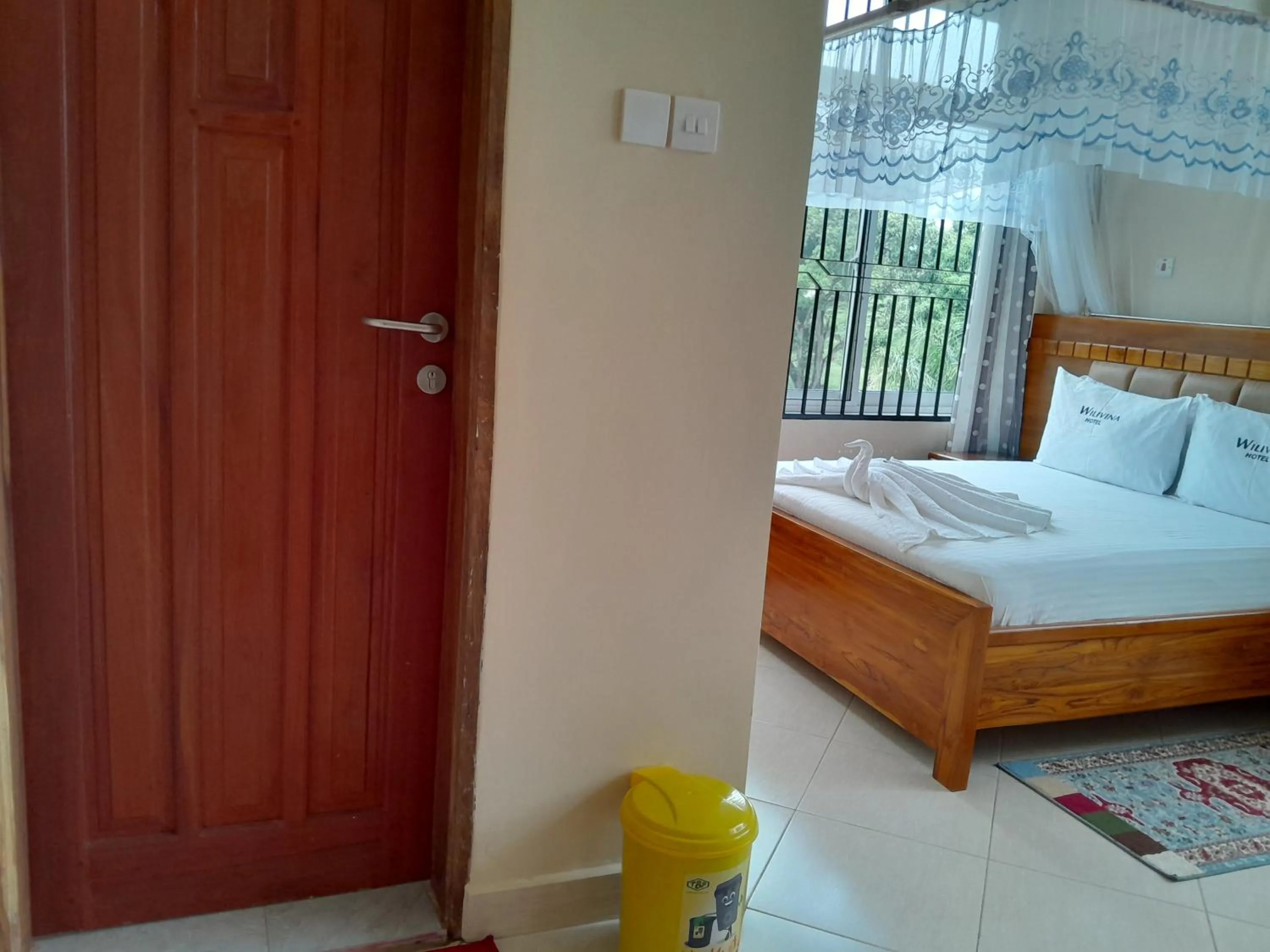 Bed in WILIVINA HOTEL