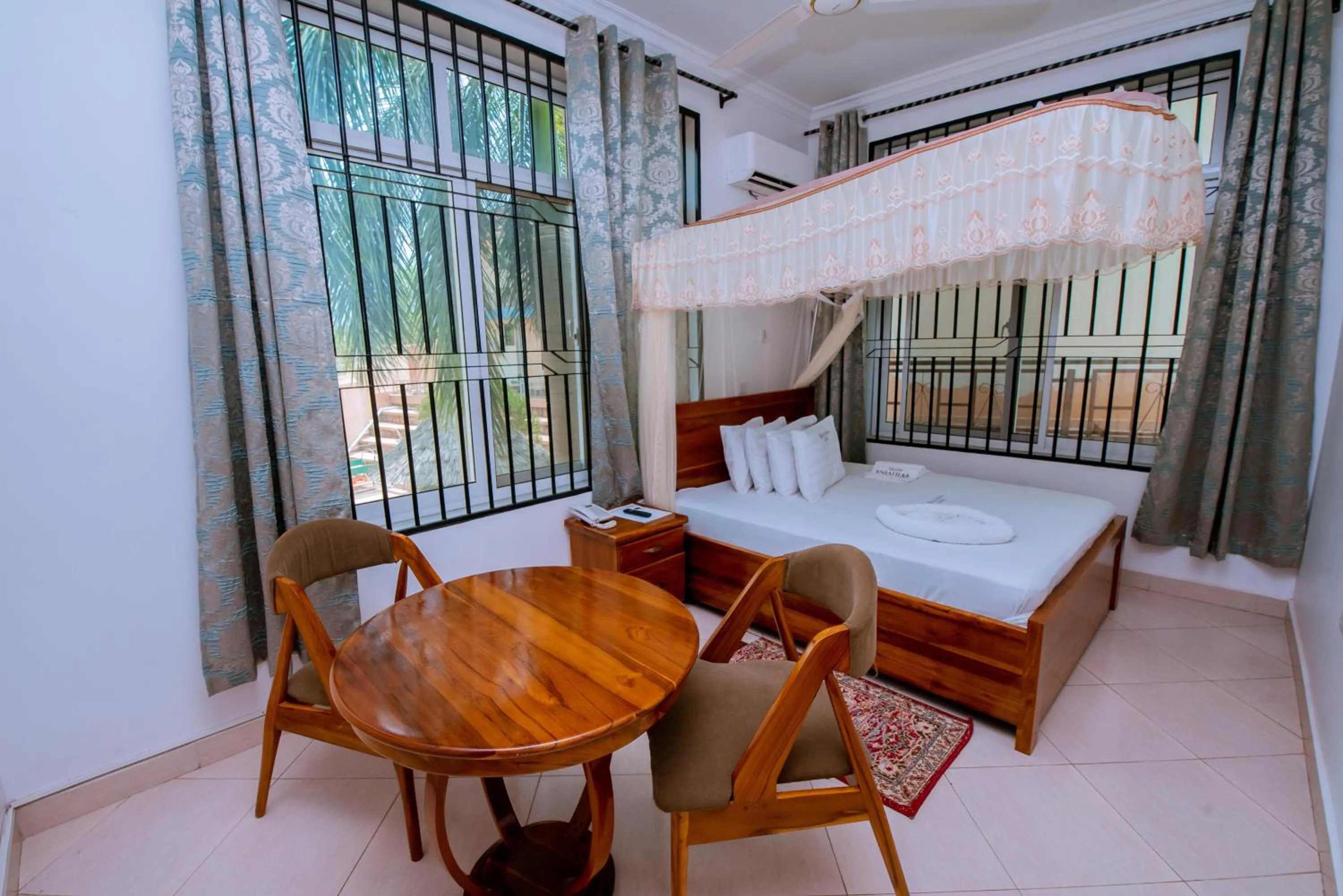 Bed in WILIVINA HOTEL