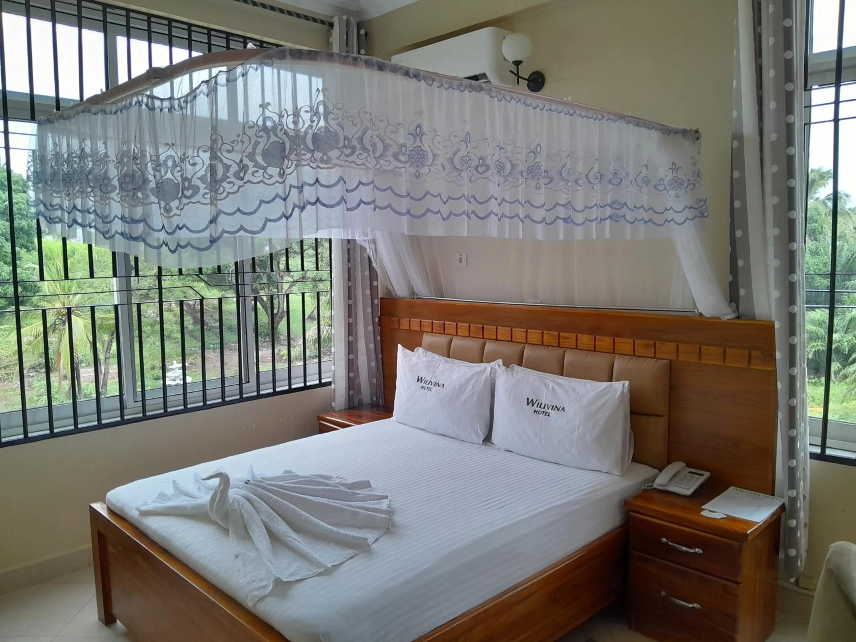 Bed in WILIVINA HOTEL