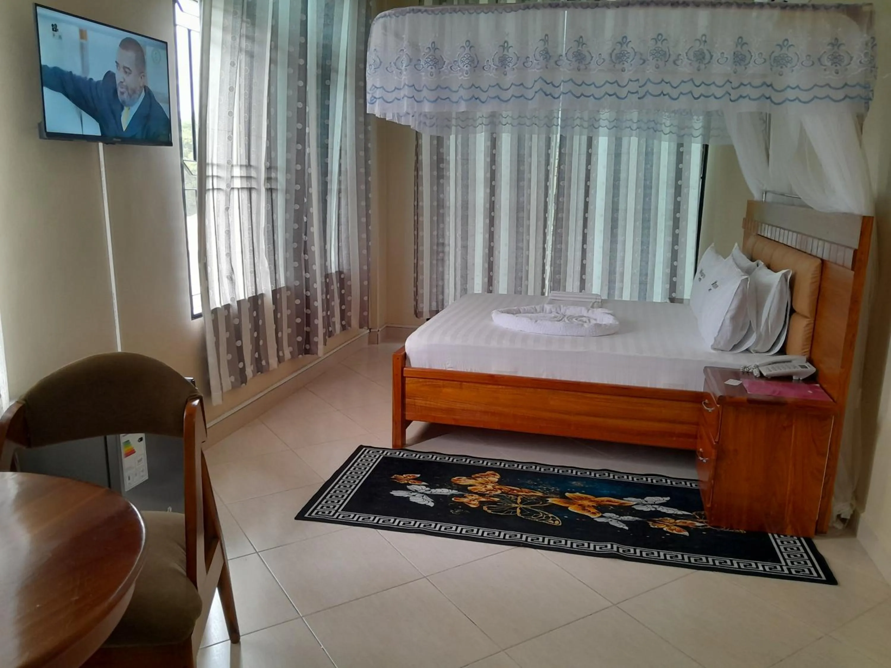 Bed in WILIVINA HOTEL