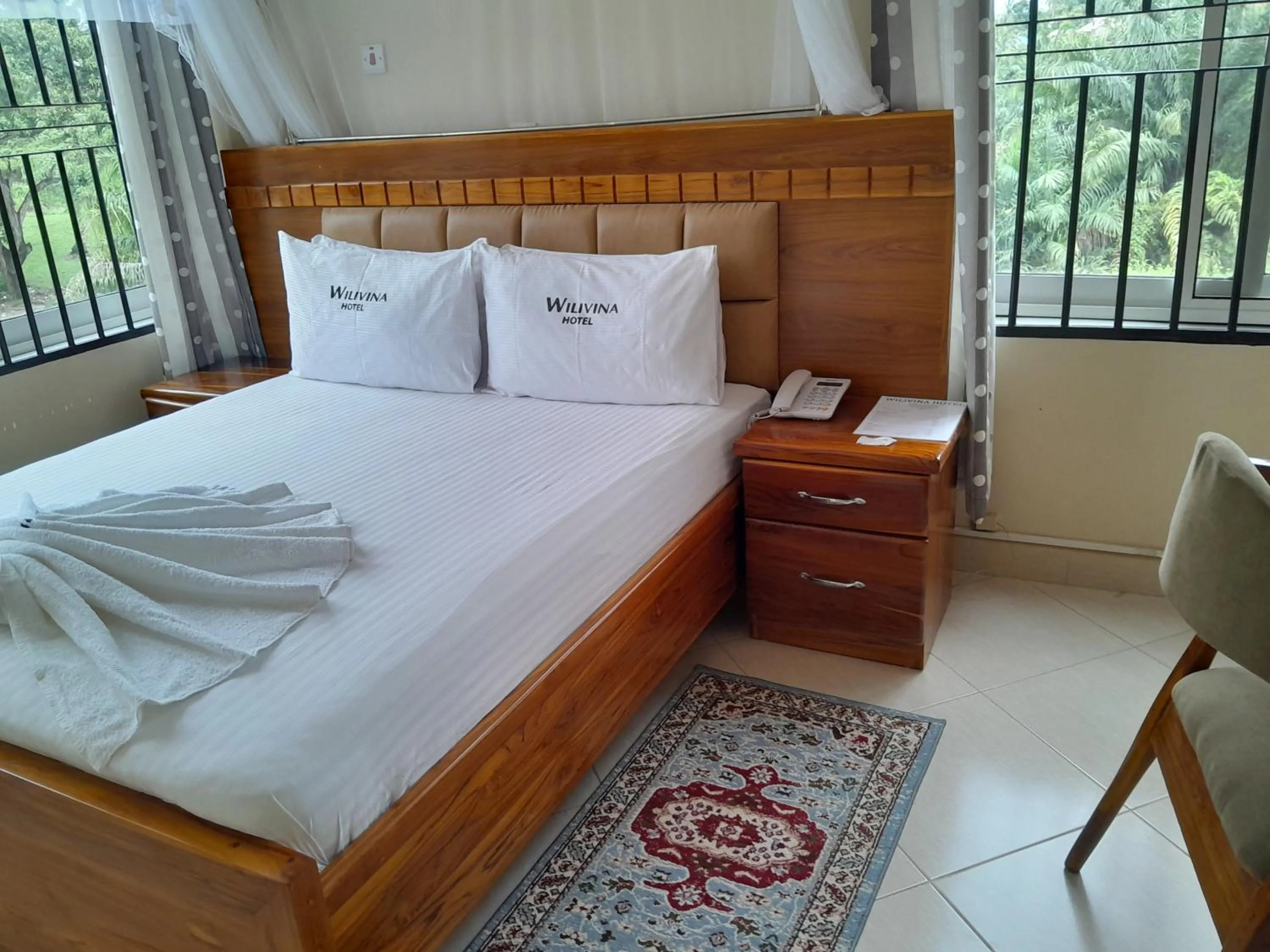 Bed in WILIVINA HOTEL