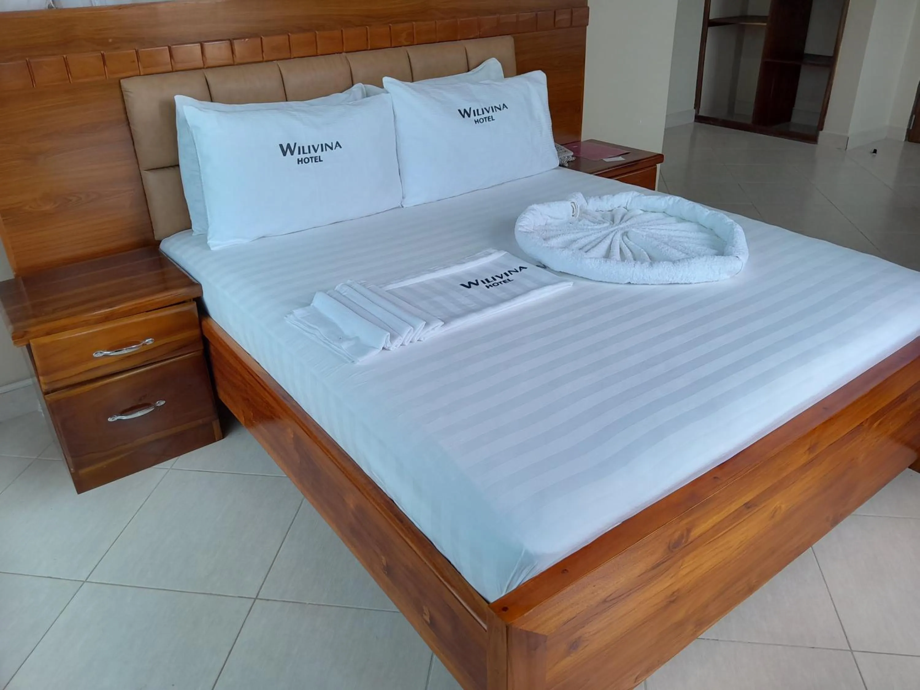 Bed in WILIVINA HOTEL