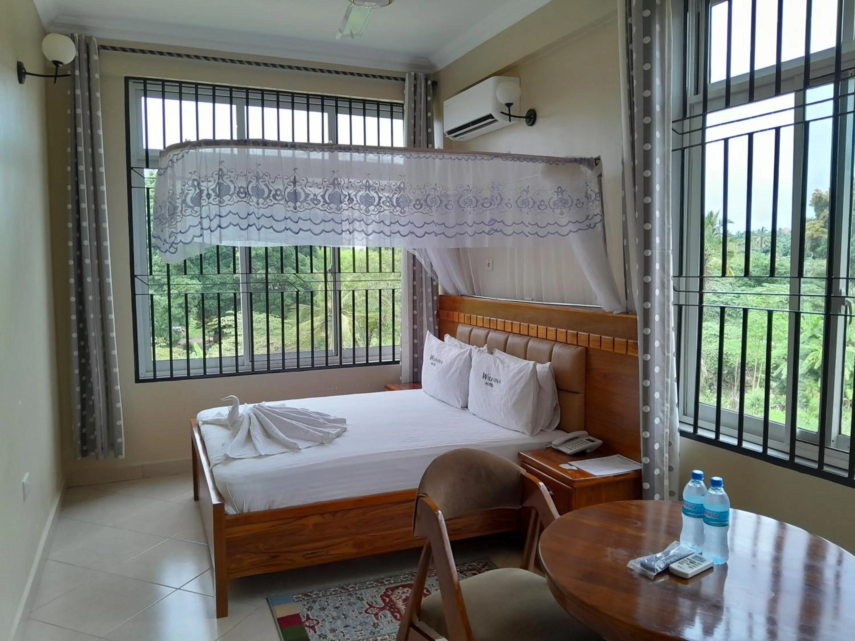 View (from property/room), Bed in WILIVINA HOTEL