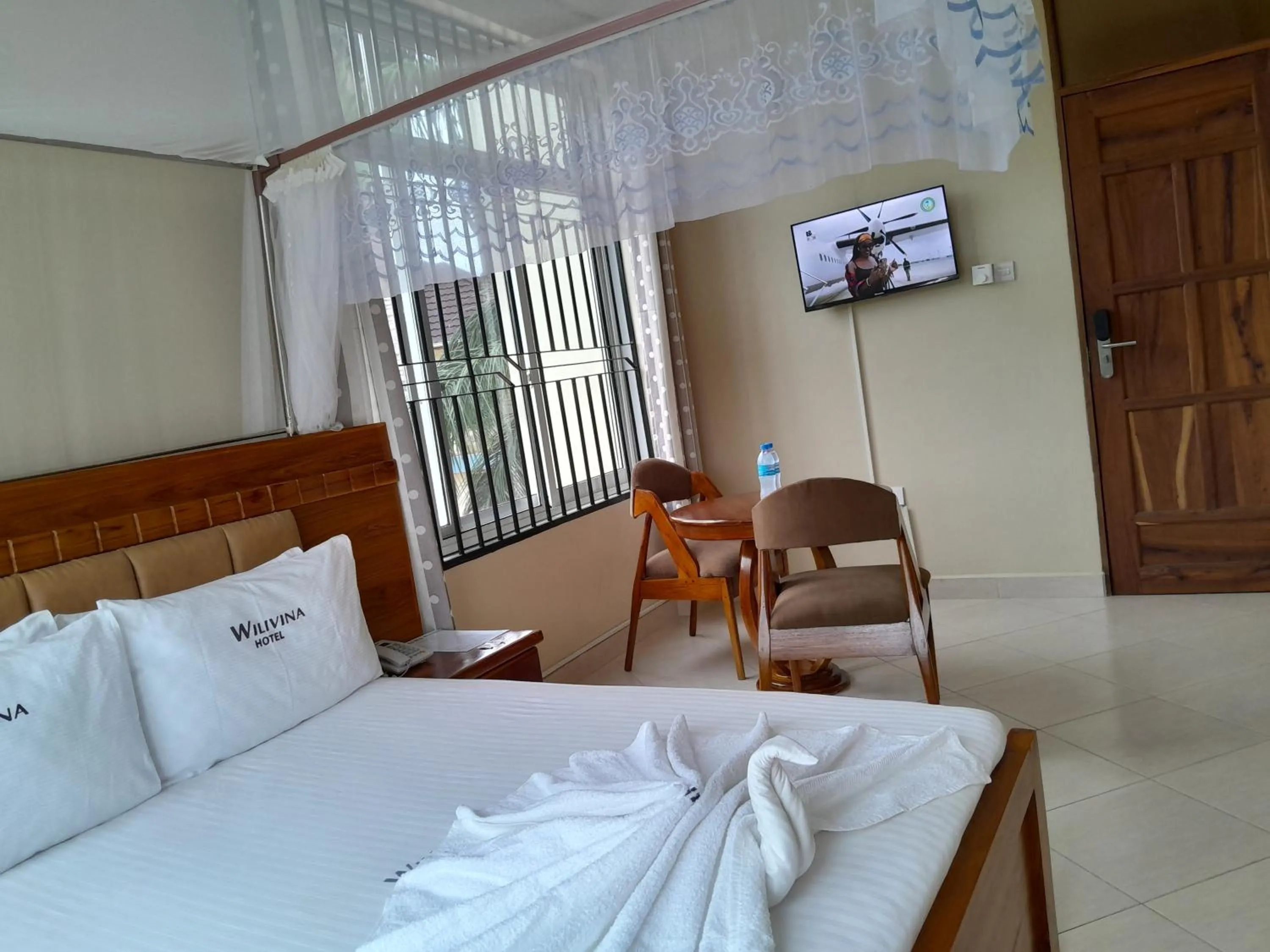 Bed in WILIVINA HOTEL