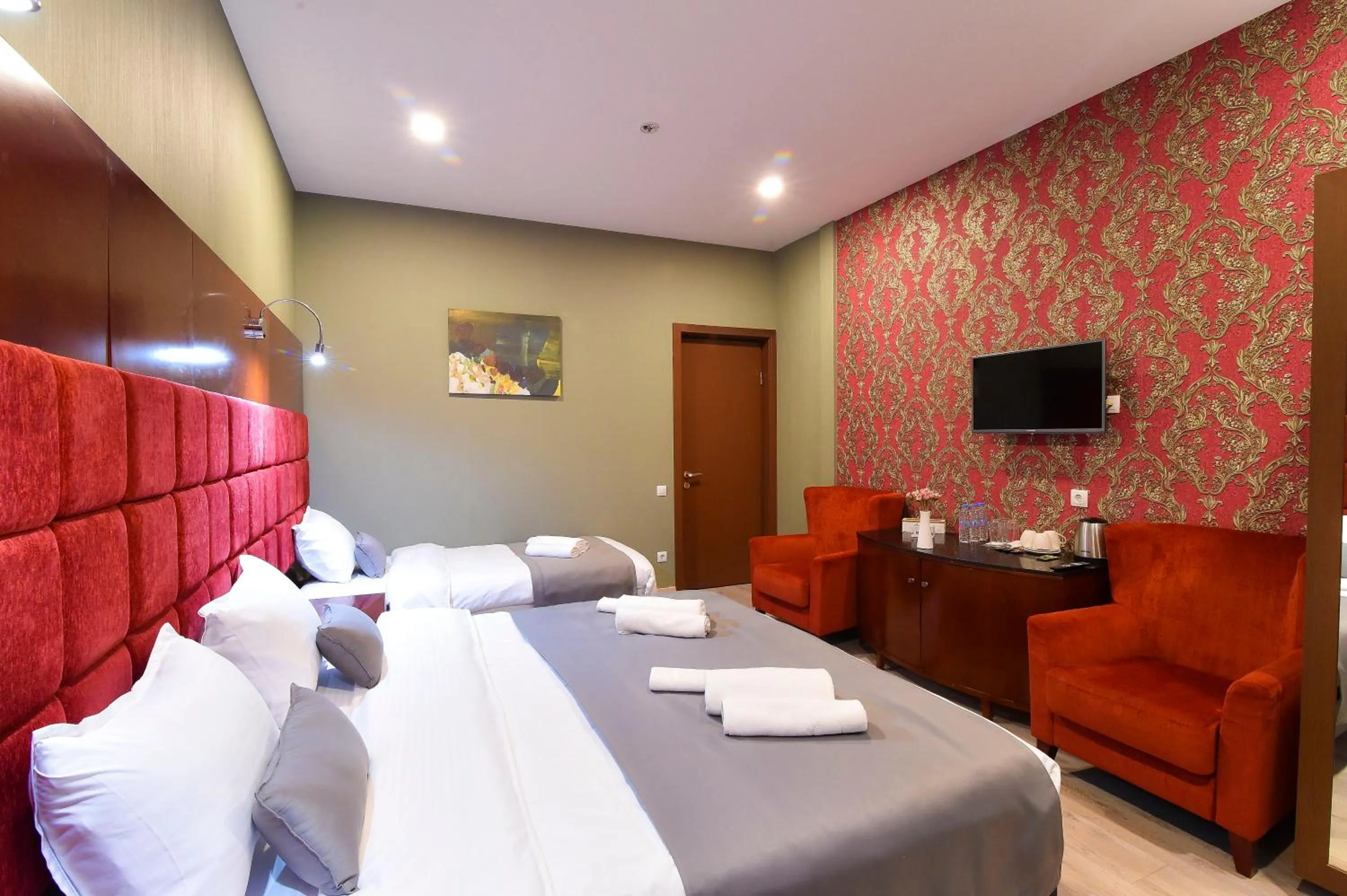 Bed in Kraveli Hotel