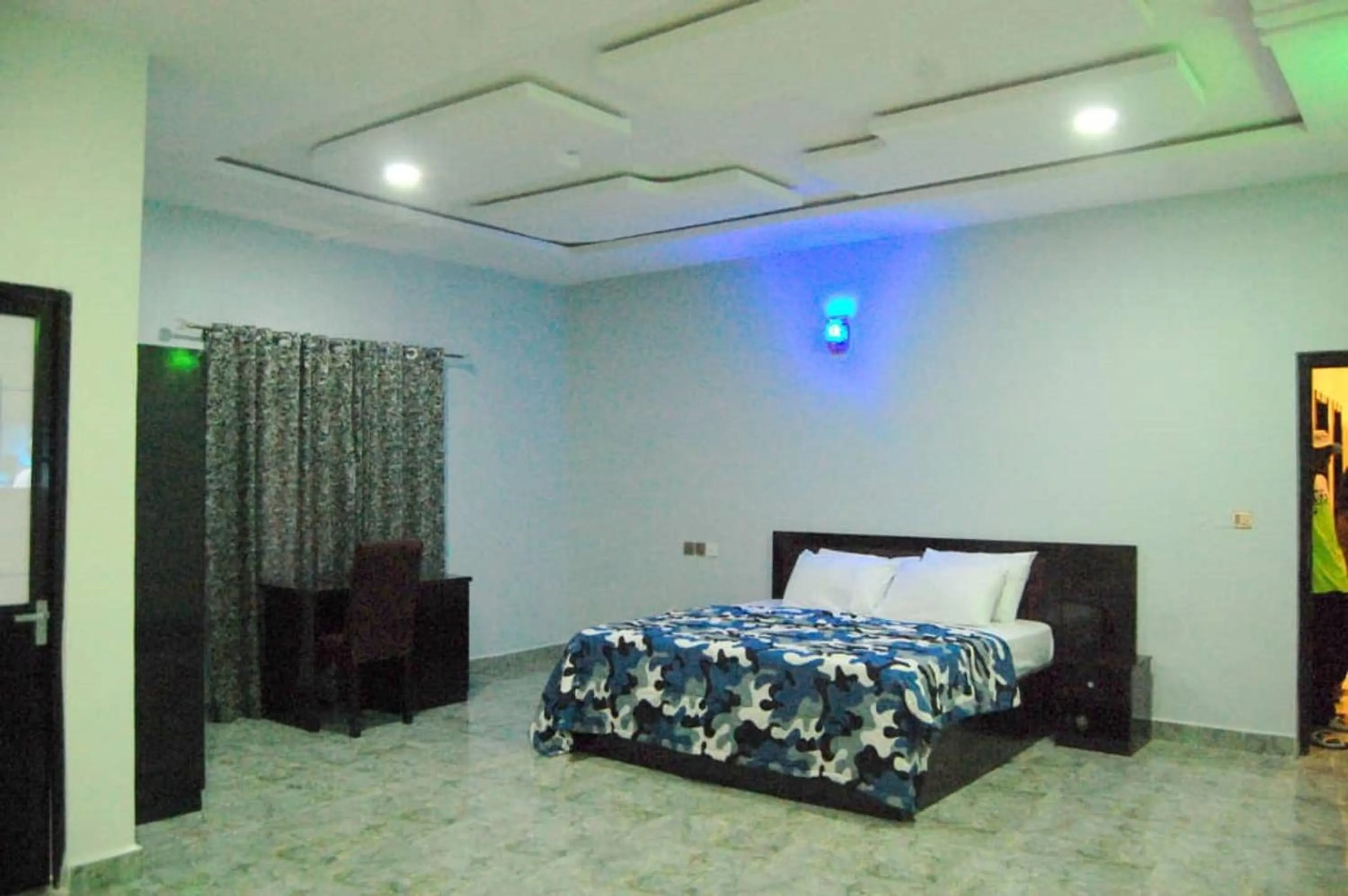 Bed in STARSAPPHIRE LUXURY HOTELS LTD