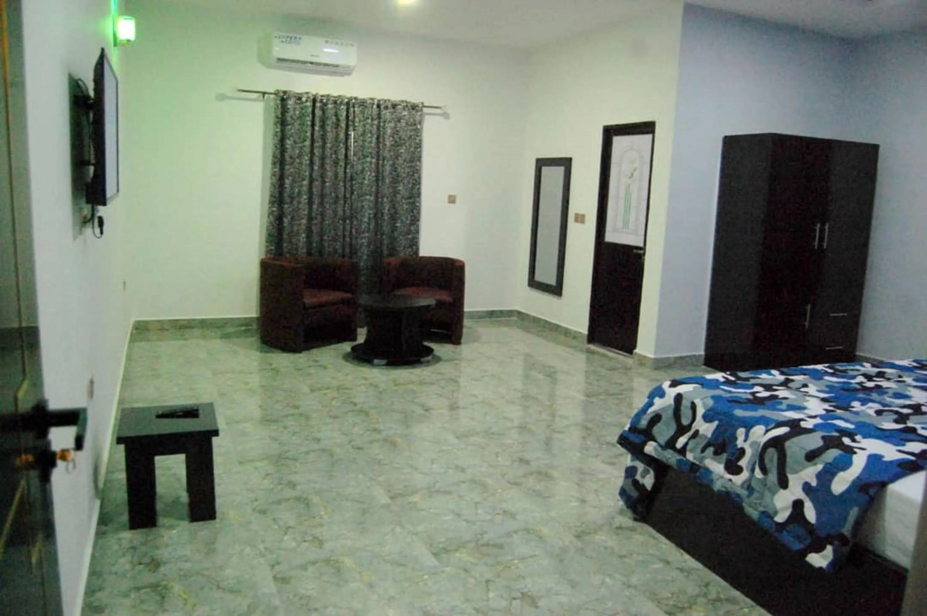 Bed in STARSAPPHIRE LUXURY HOTELS LTD