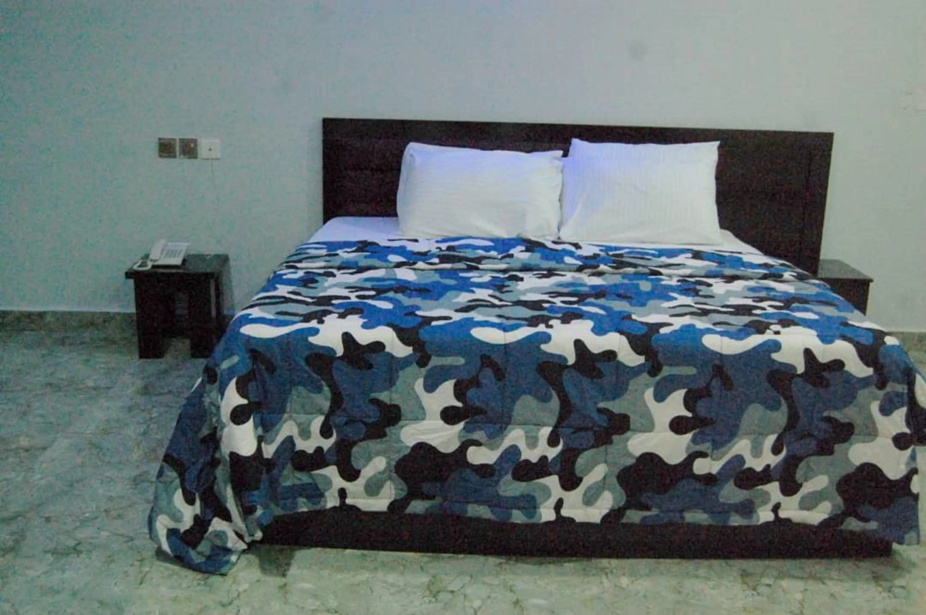 Bed in STARSAPPHIRE LUXURY HOTELS LTD