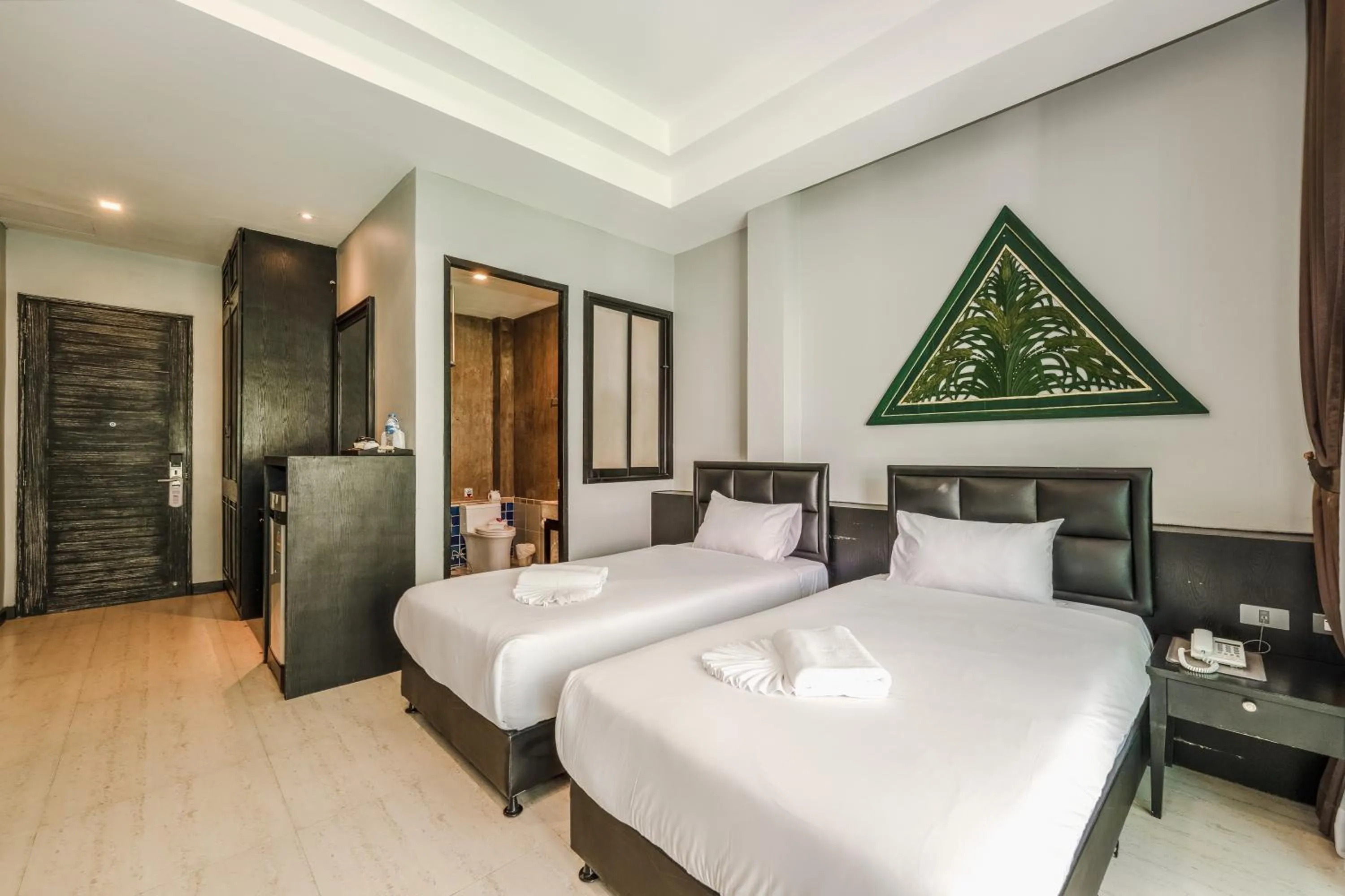 Bed in Coco Retreat Phuket Resort and Spa - SHA Plus