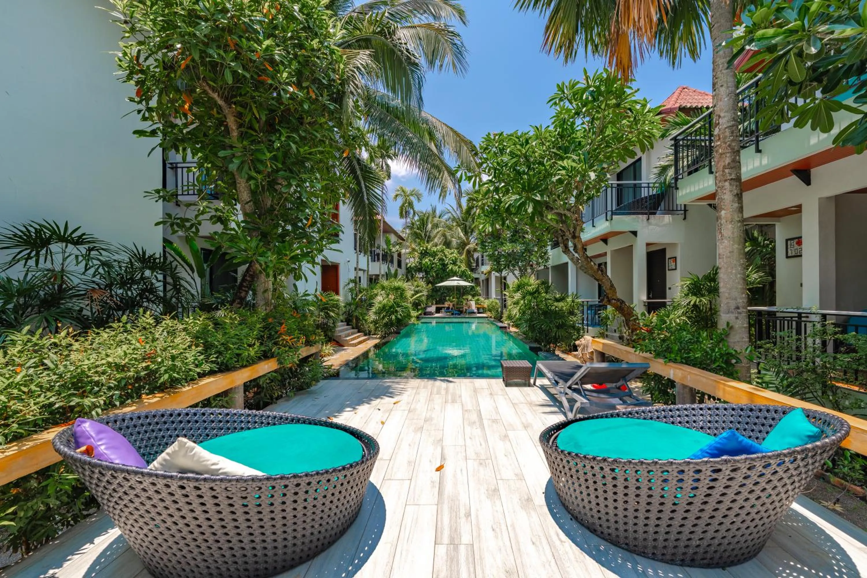 Swimming pool in Coco Retreat Phuket Resort and Spa - SHA Plus