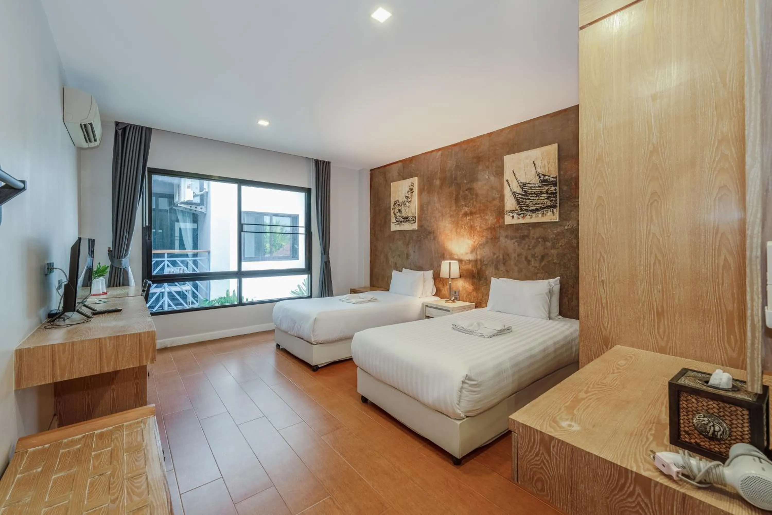 Bed in Coco Retreat Phuket Resort and Spa - SHA Plus