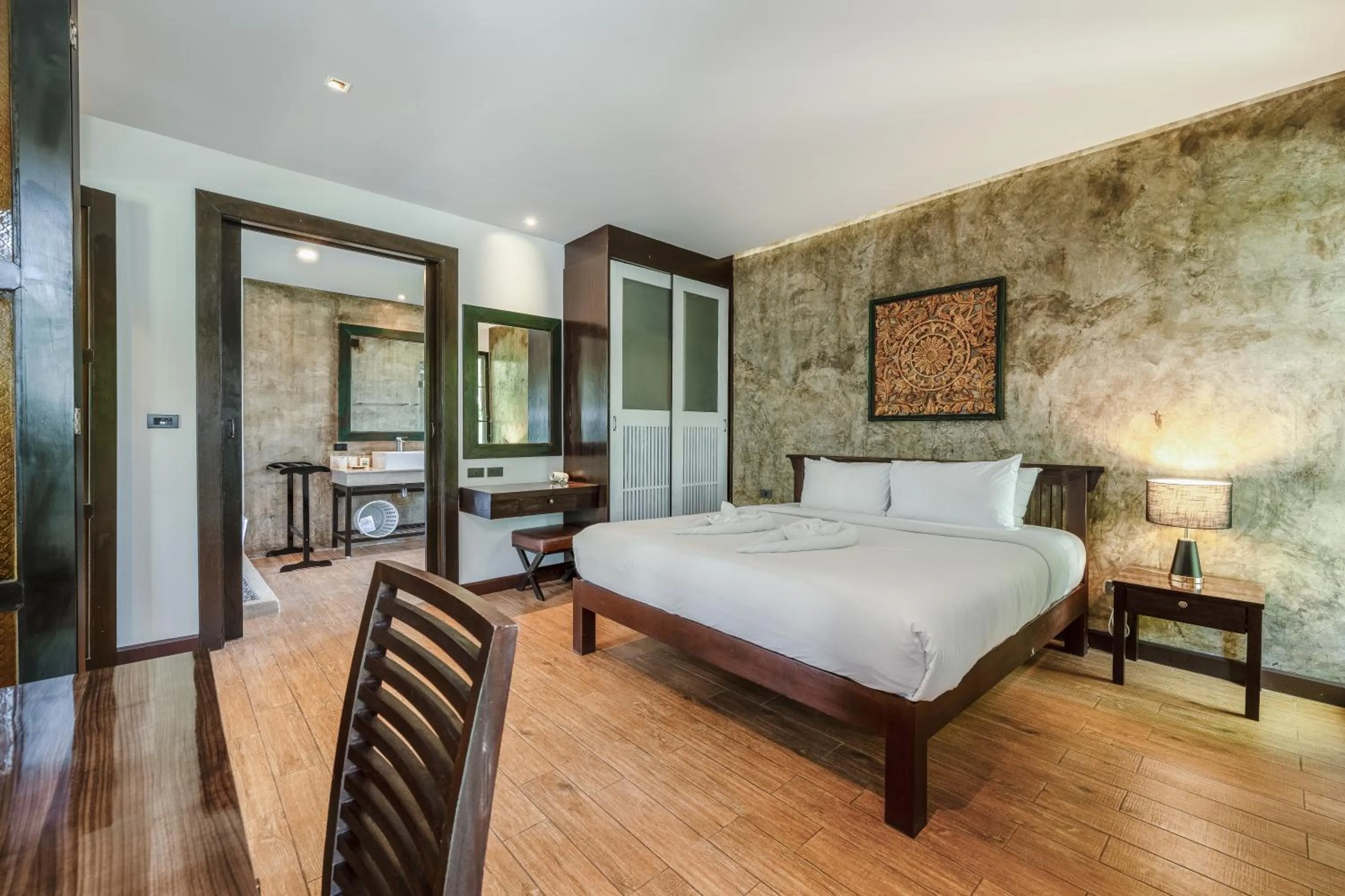 Bed in Coco Retreat Phuket Resort and Spa - SHA Plus