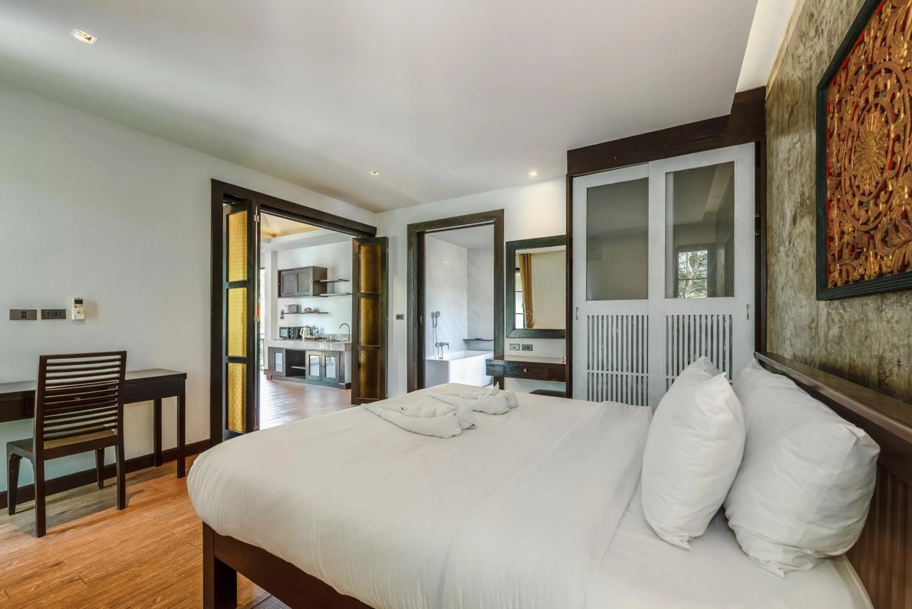 Bed in Coco Retreat Phuket Resort and Spa - SHA Plus