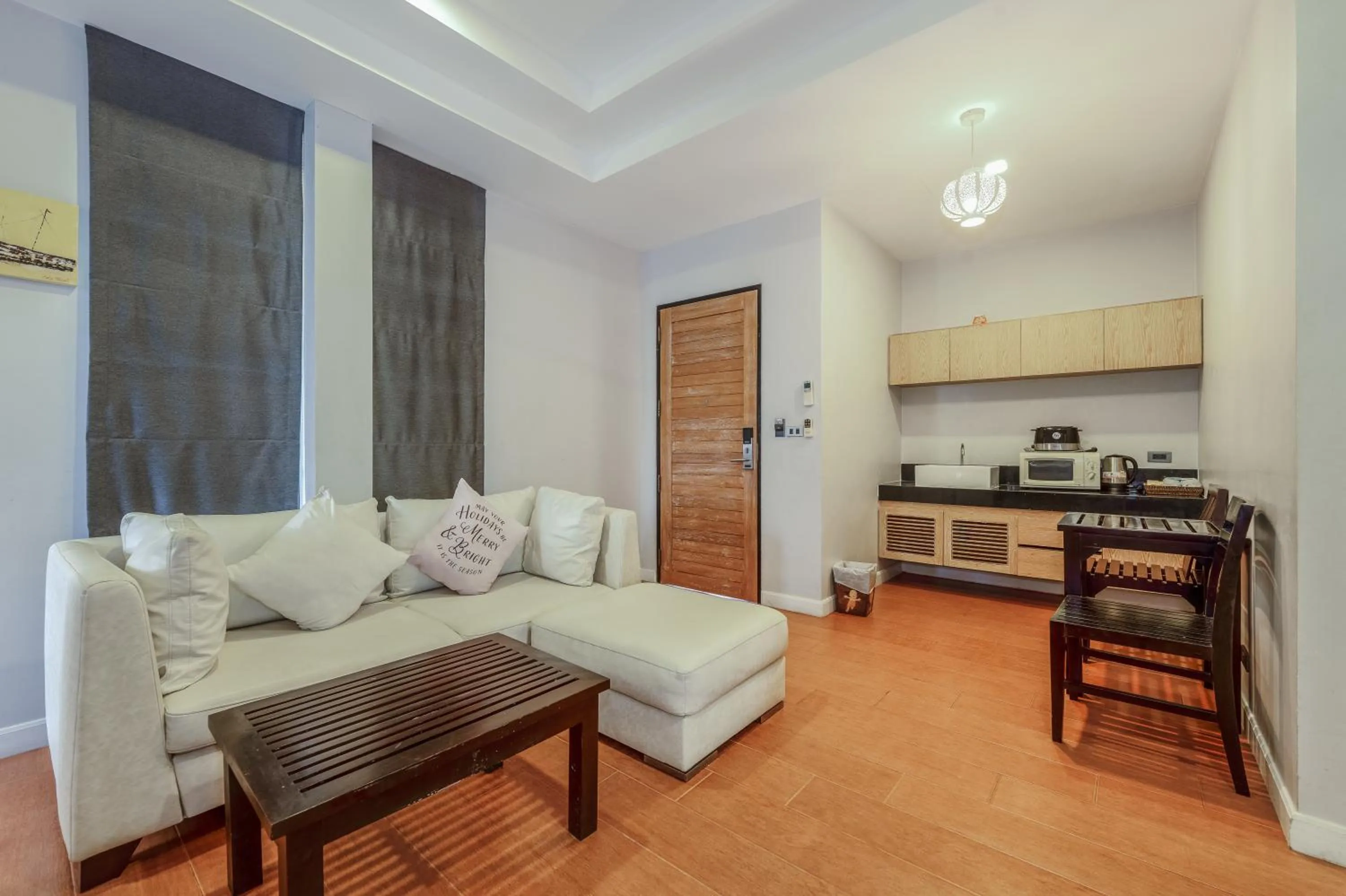 Living room in Coco Retreat Phuket Resort and Spa - SHA Plus