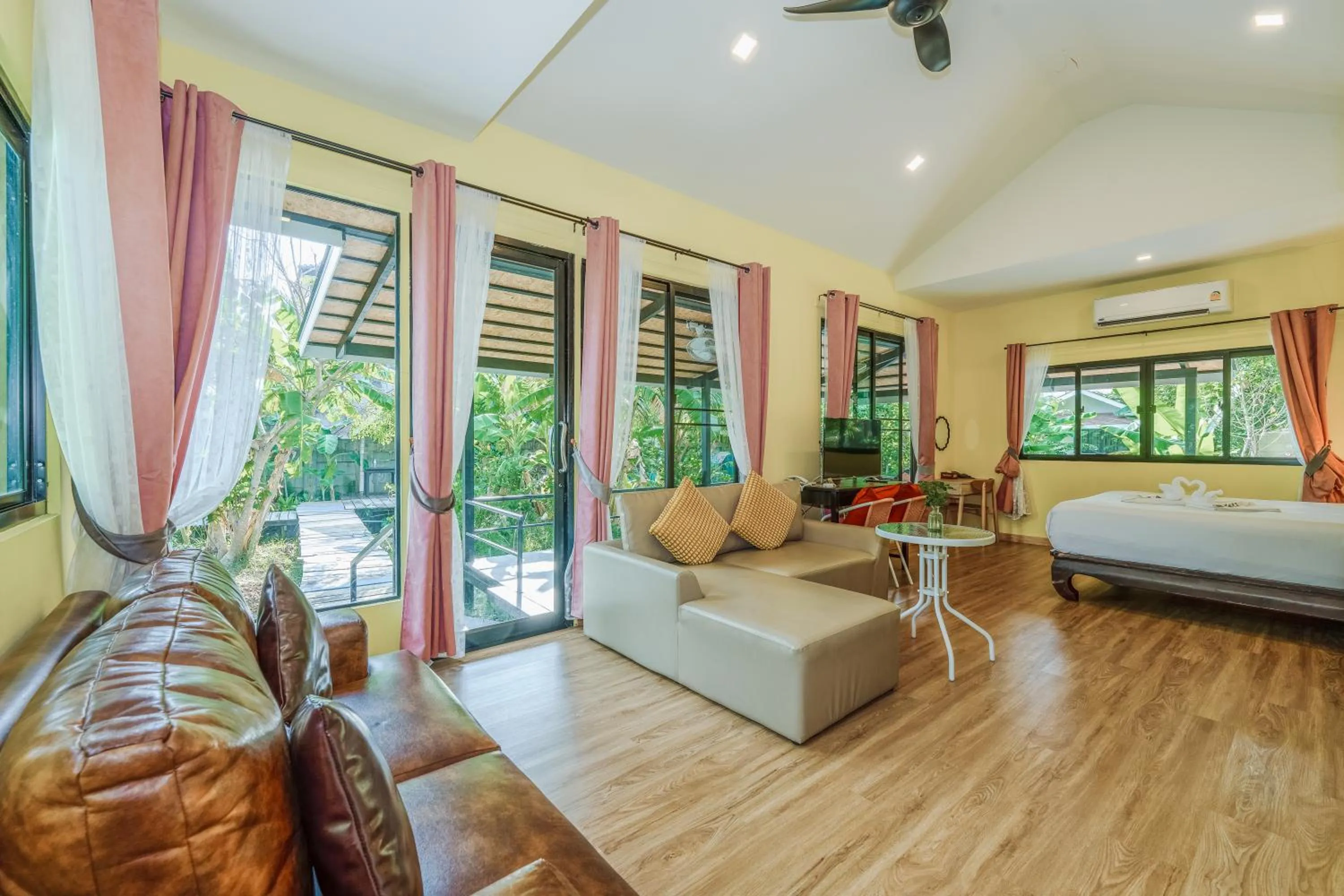 Living room, Bed in Coco Retreat Phuket Resort and Spa - SHA Plus