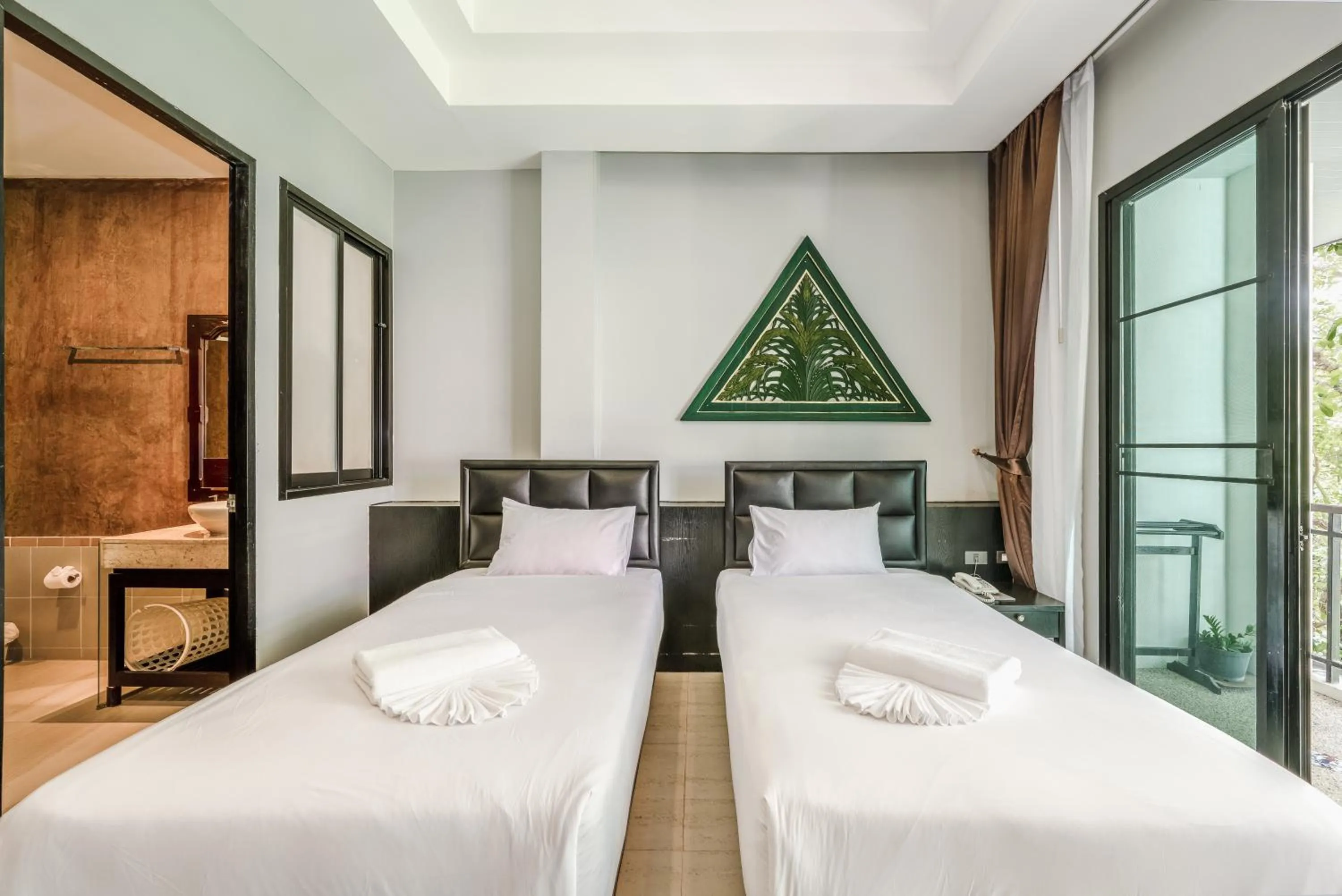 Bed in Coco Retreat Phuket Resort and Spa - SHA Plus