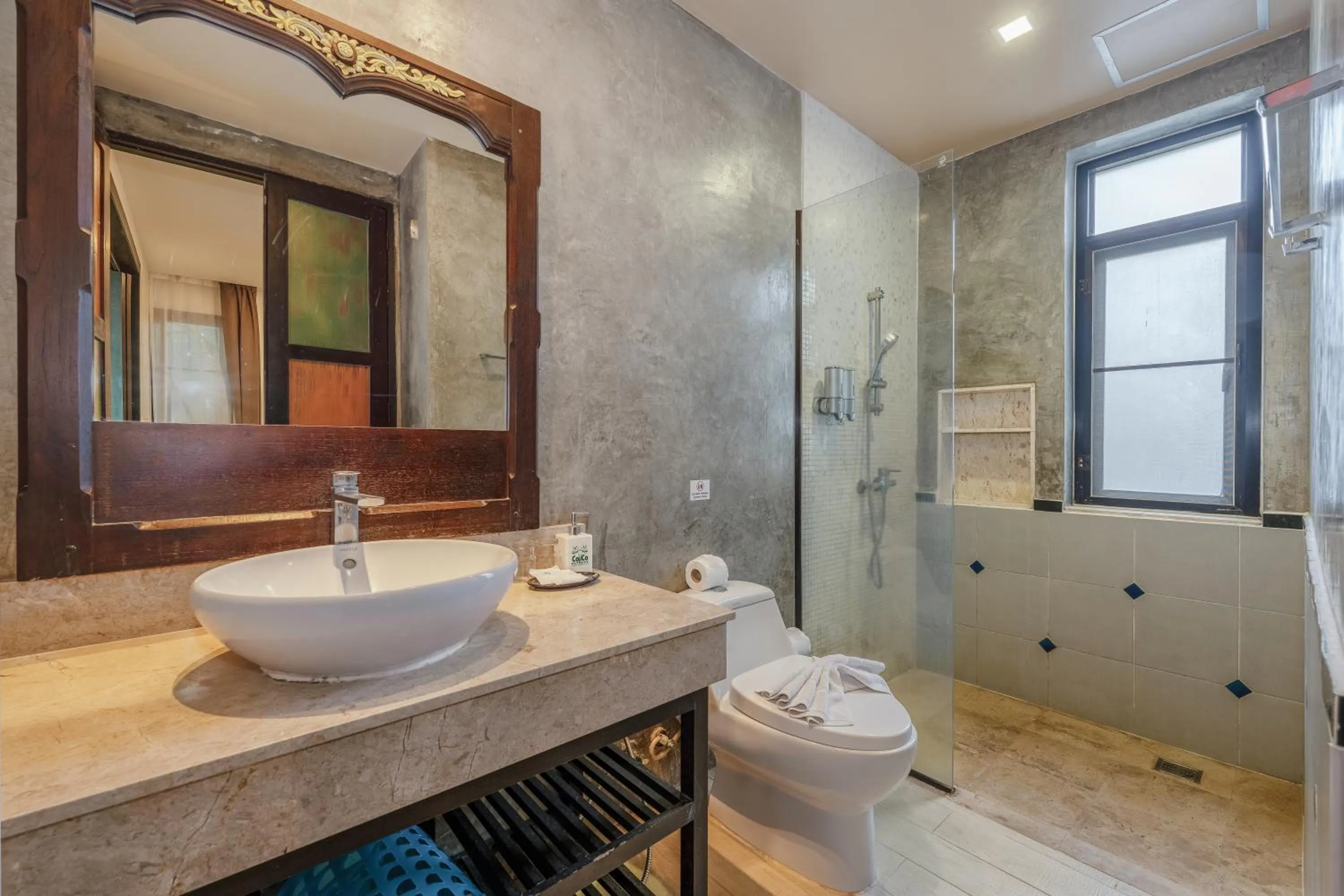 Bathroom in Coco Retreat Phuket Resort and Spa - SHA Plus