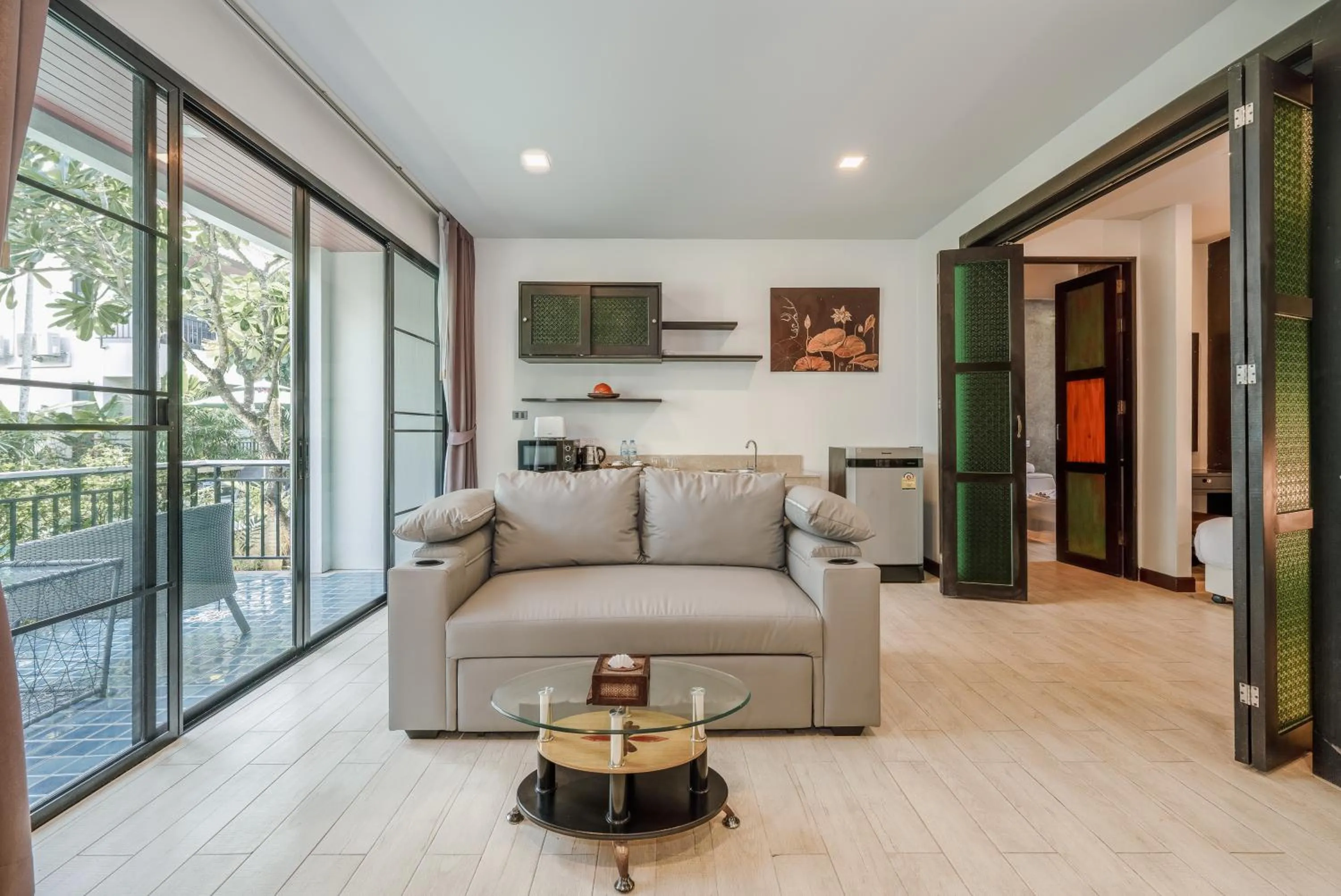 Living room in Coco Retreat Phuket Resort and Spa - SHA Plus