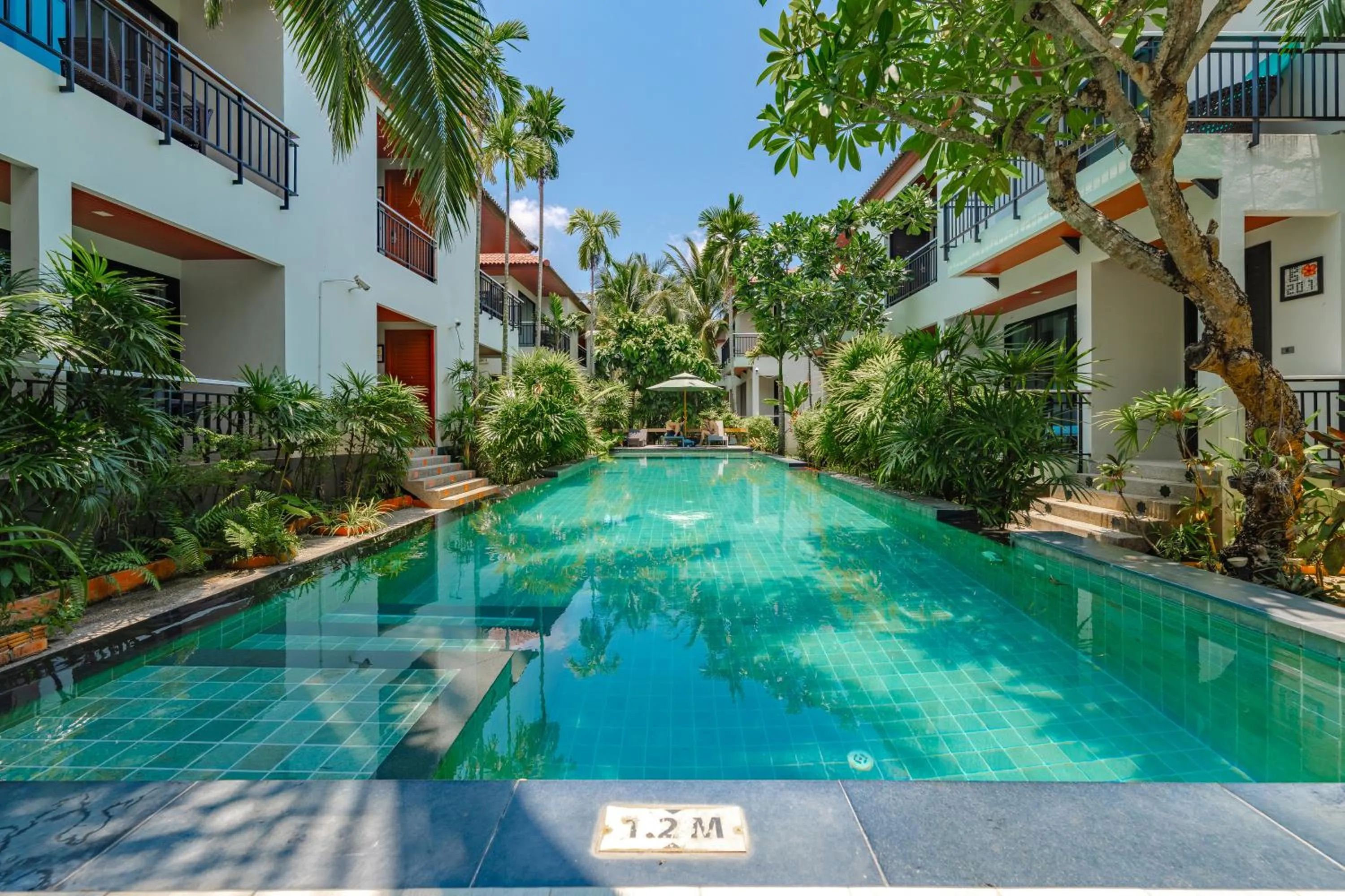 Swimming pool in Coco Retreat Phuket Resort and Spa - SHA Plus