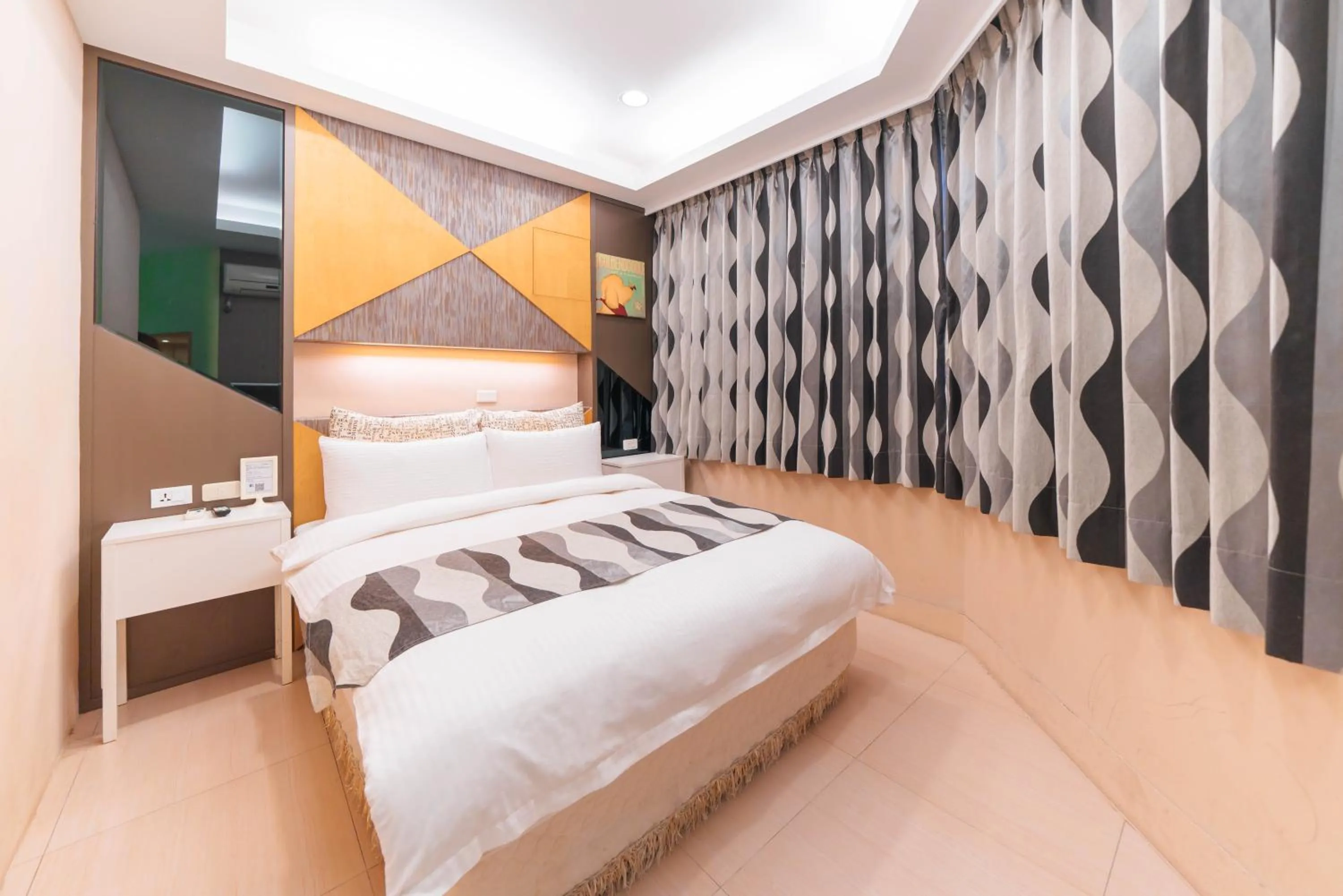 Bed in Story Inn City